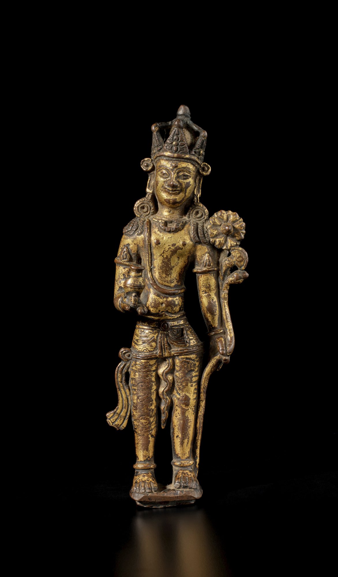 A gilt-copper alloy figure of Padmapani — 西藏 約十二世紀 銅合金鎏金蓮華手觀音立像