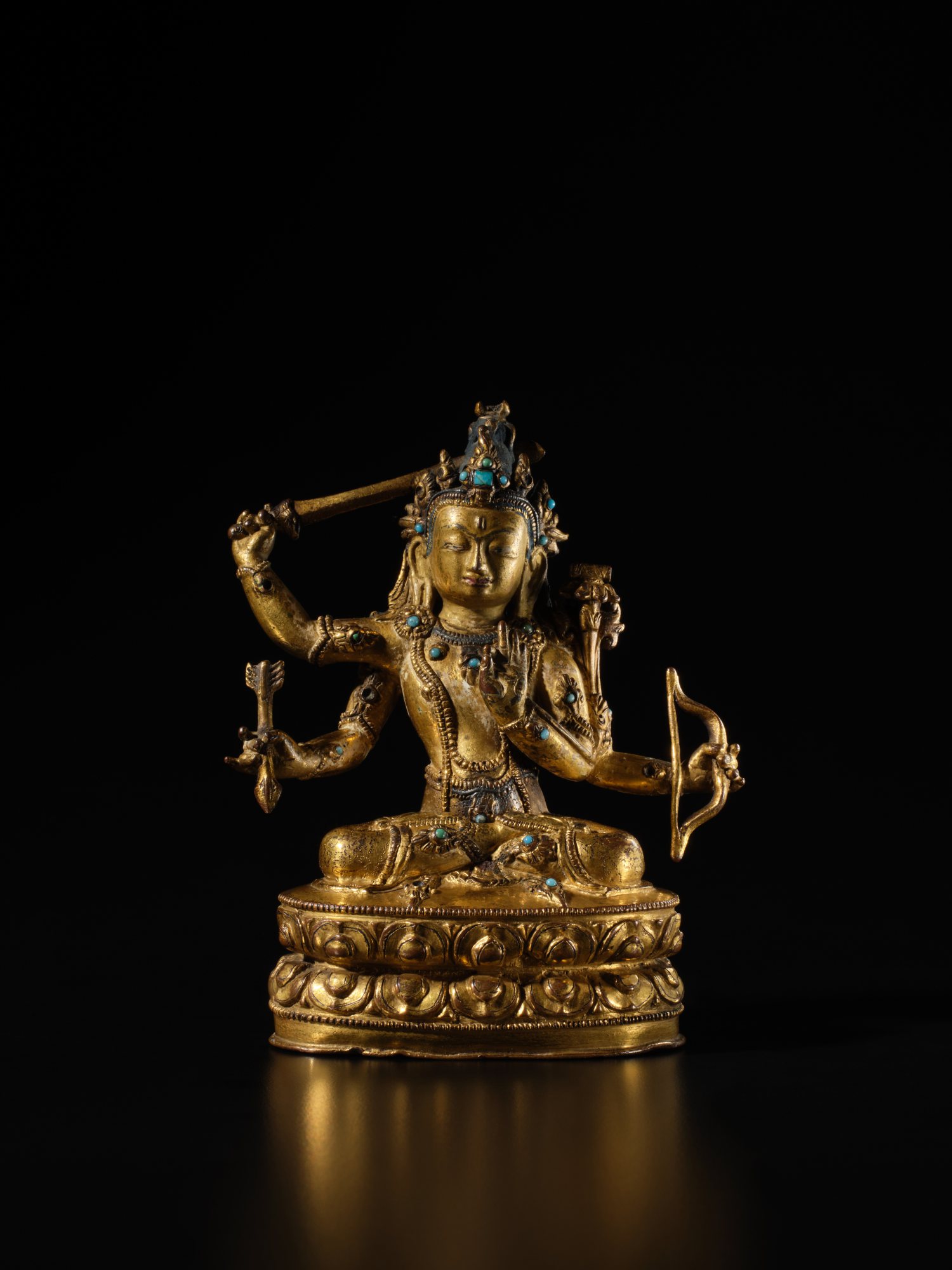 Unknown — 西藏 十五世紀 銅合金鎏金錯銀嵌寶文殊菩薩坐像