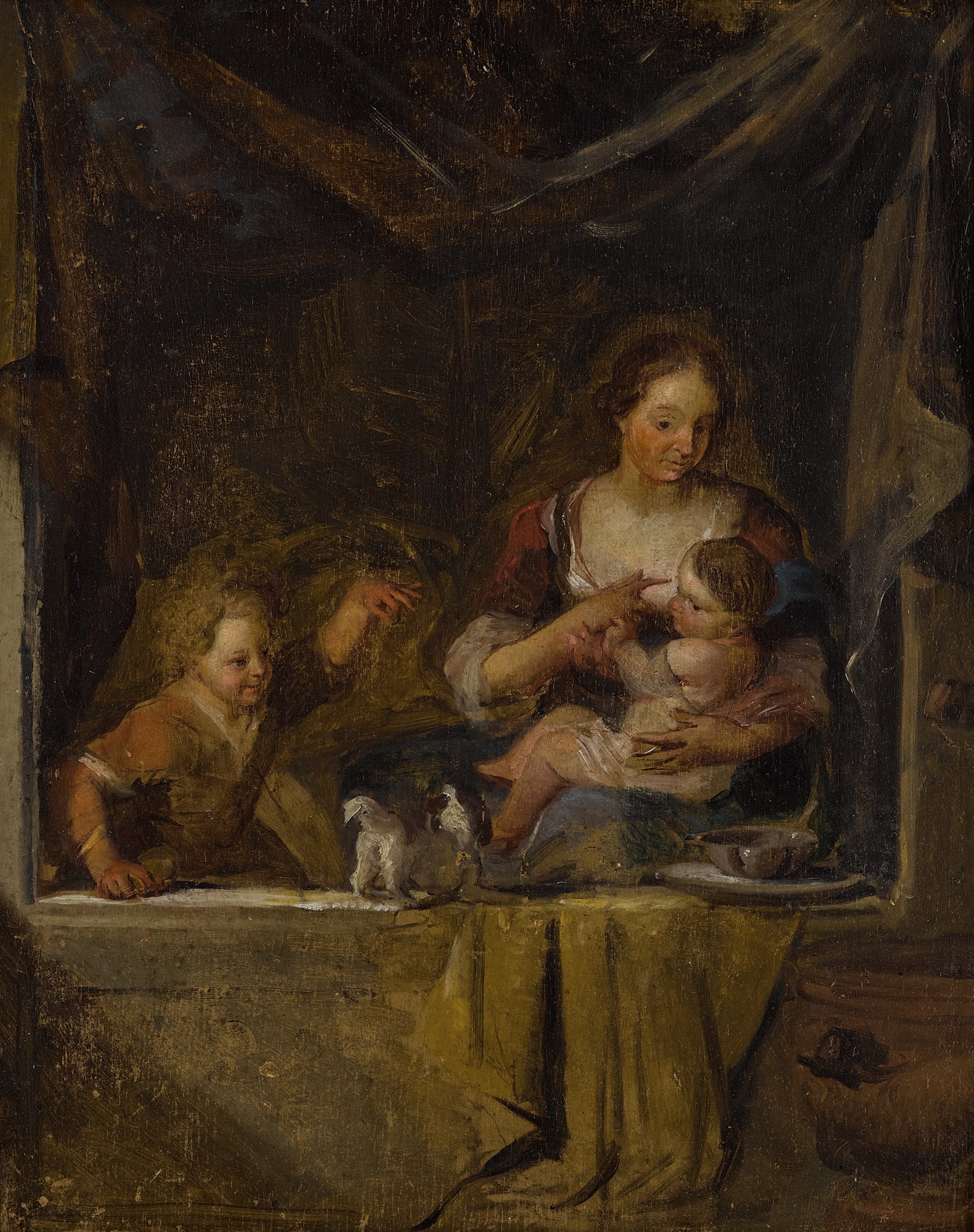 A nursing mother with a young boy and a dog