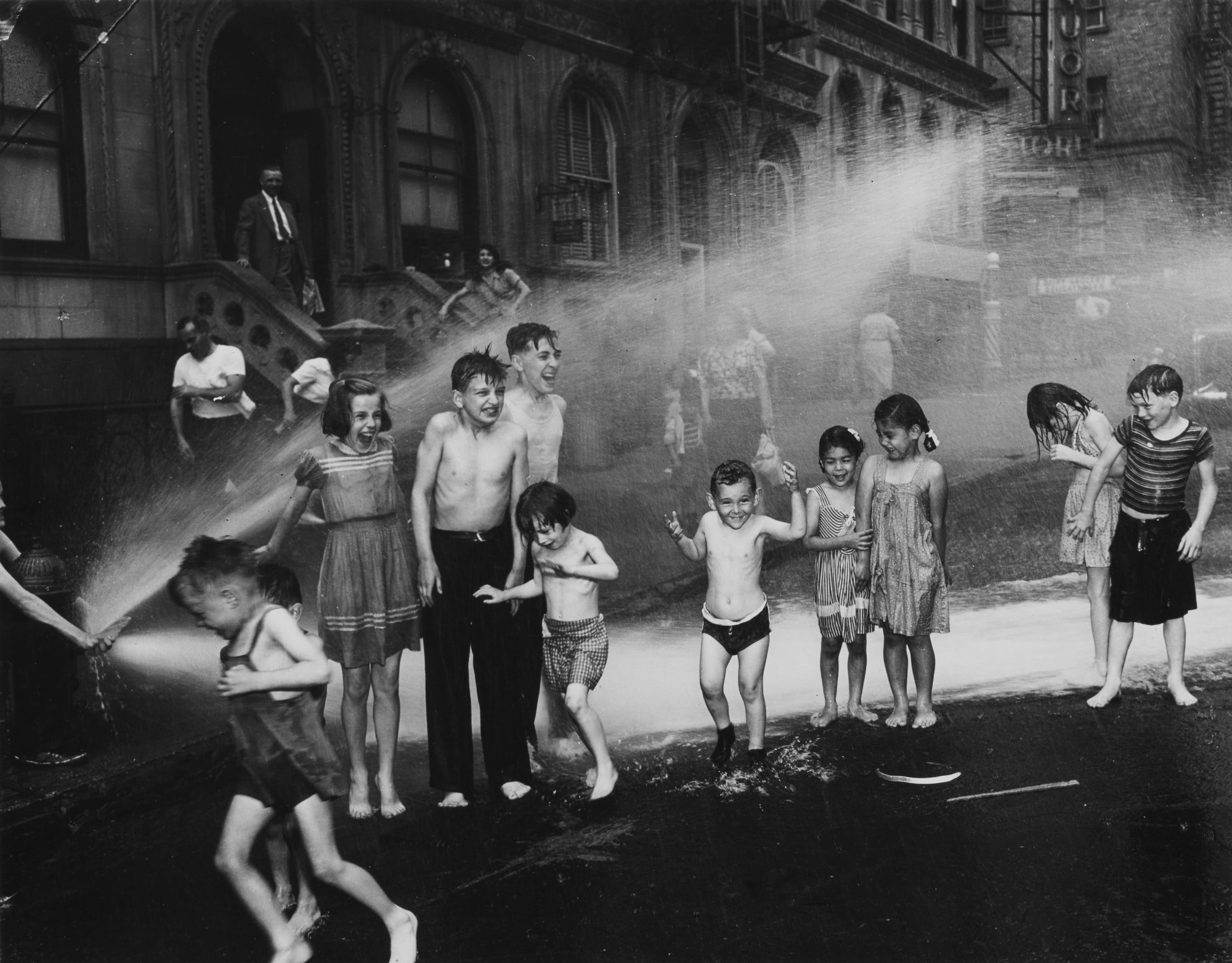 Weegee (Arthur Fellig) — Untitled (Summer, The Lower East Side, New York City)