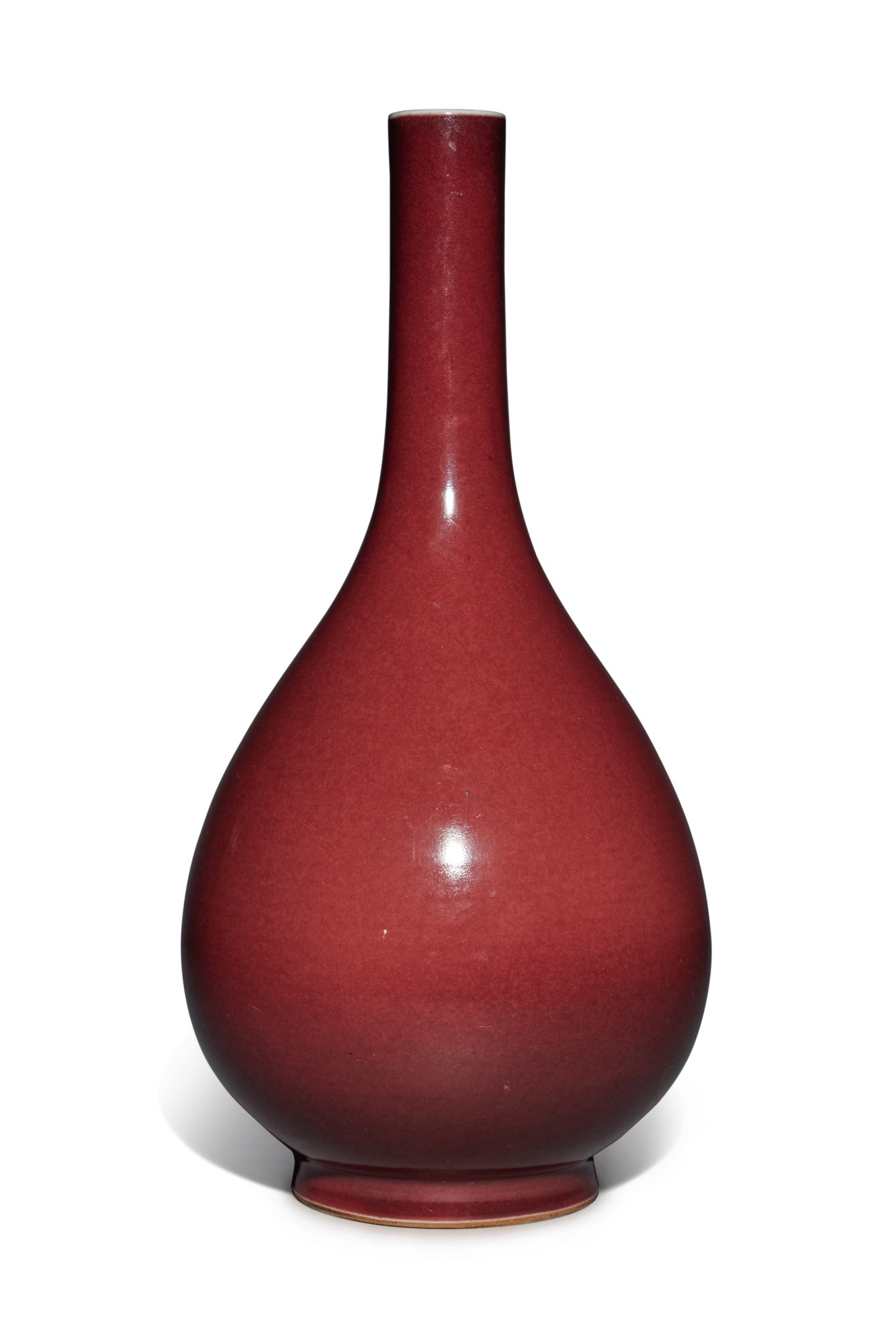 A copper-red-glazed bottle vase — 清十八 / 十九世紀 紅釉長頸瓶