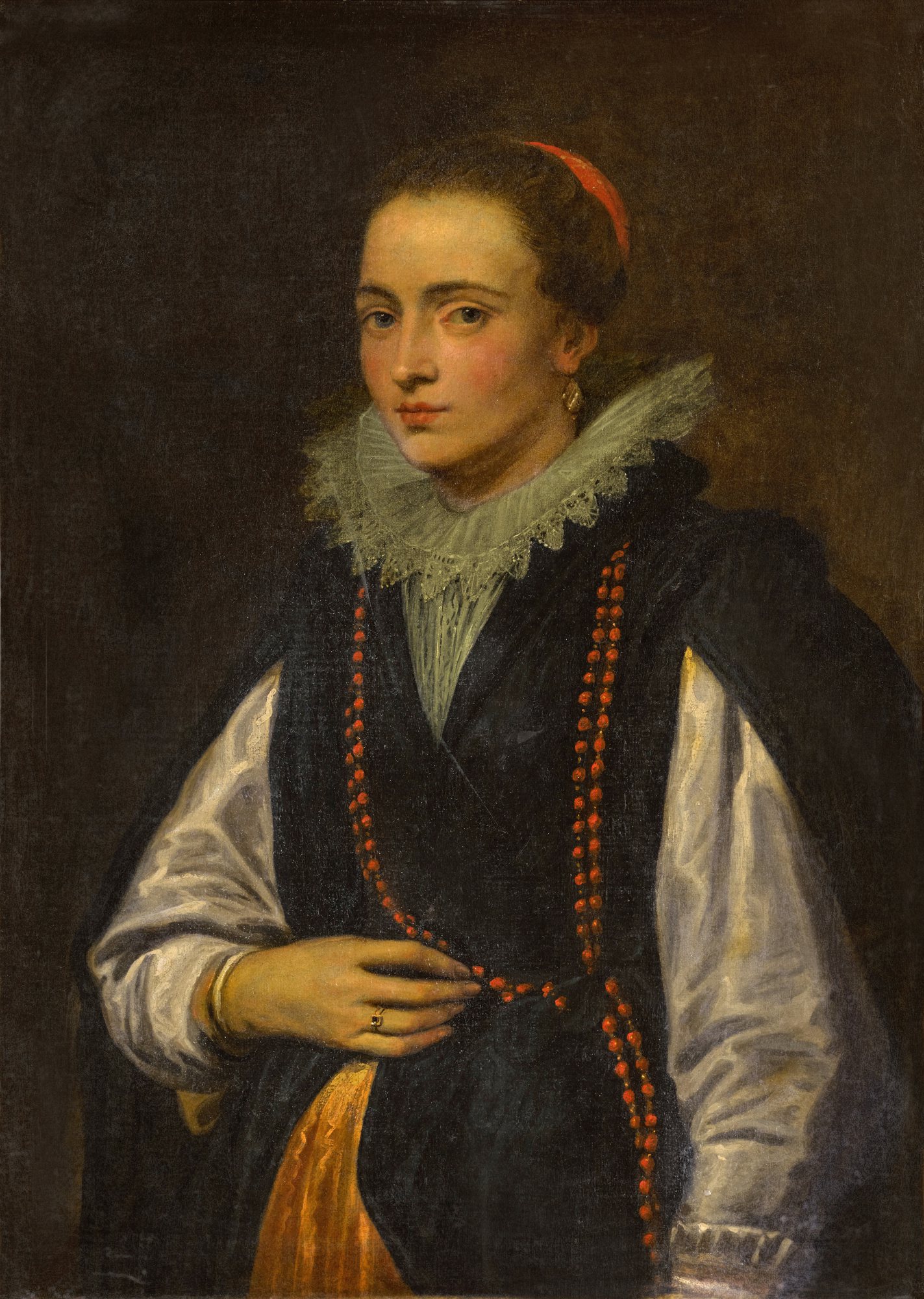 Portrait of an unknown Genoese woman, three-quarter length, in a black coat and white sleeves