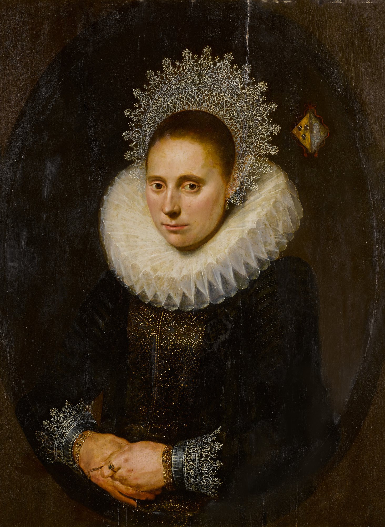 Flemish School, 17th Century — Portrait of a woman wearing a fan-shaped headdress, three-quarter-length