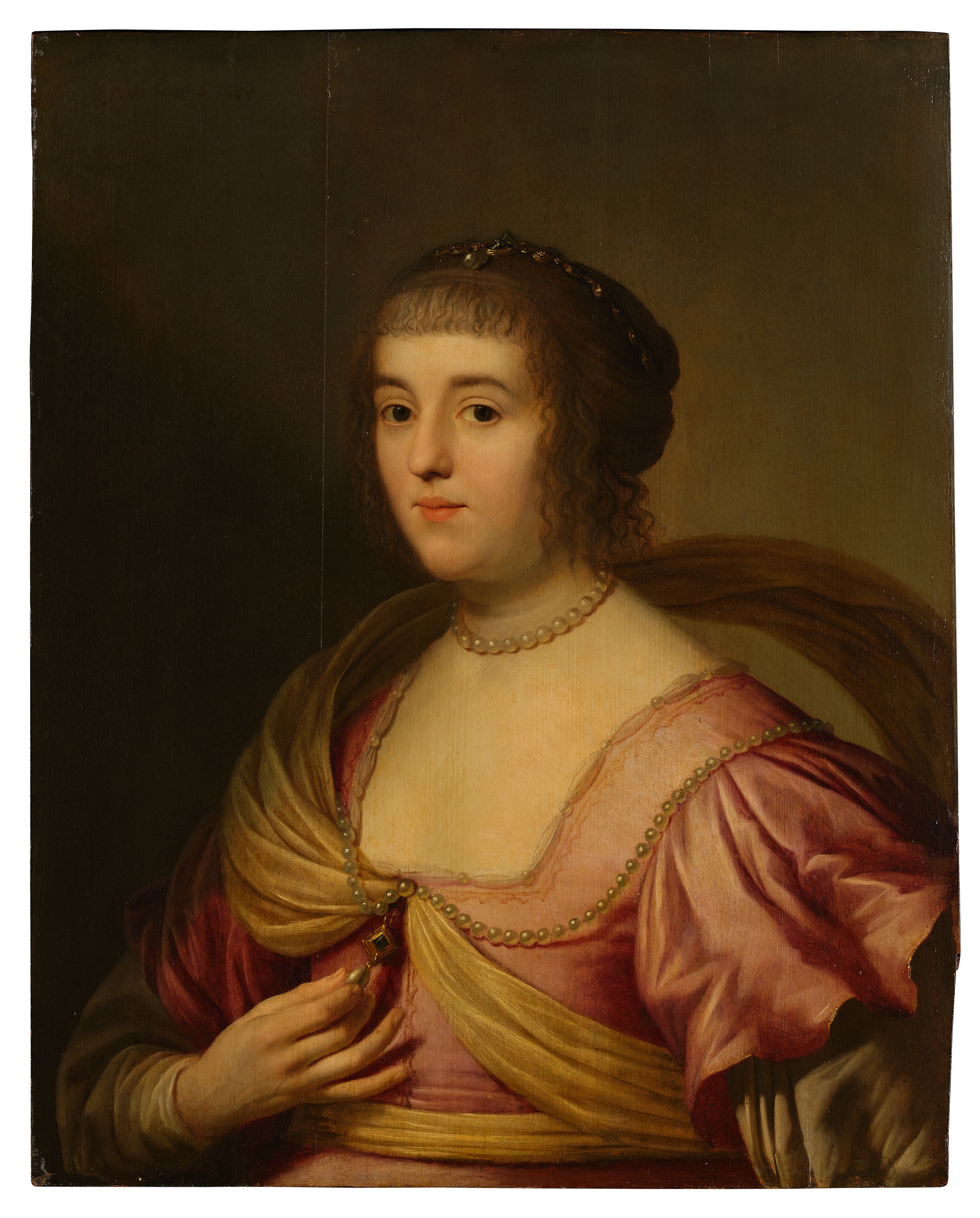 Gerard van Honthorst — Portrait of Amalia van Solms, in a pink dress with a yellow sash, half-length, adorned with pearls and jewels