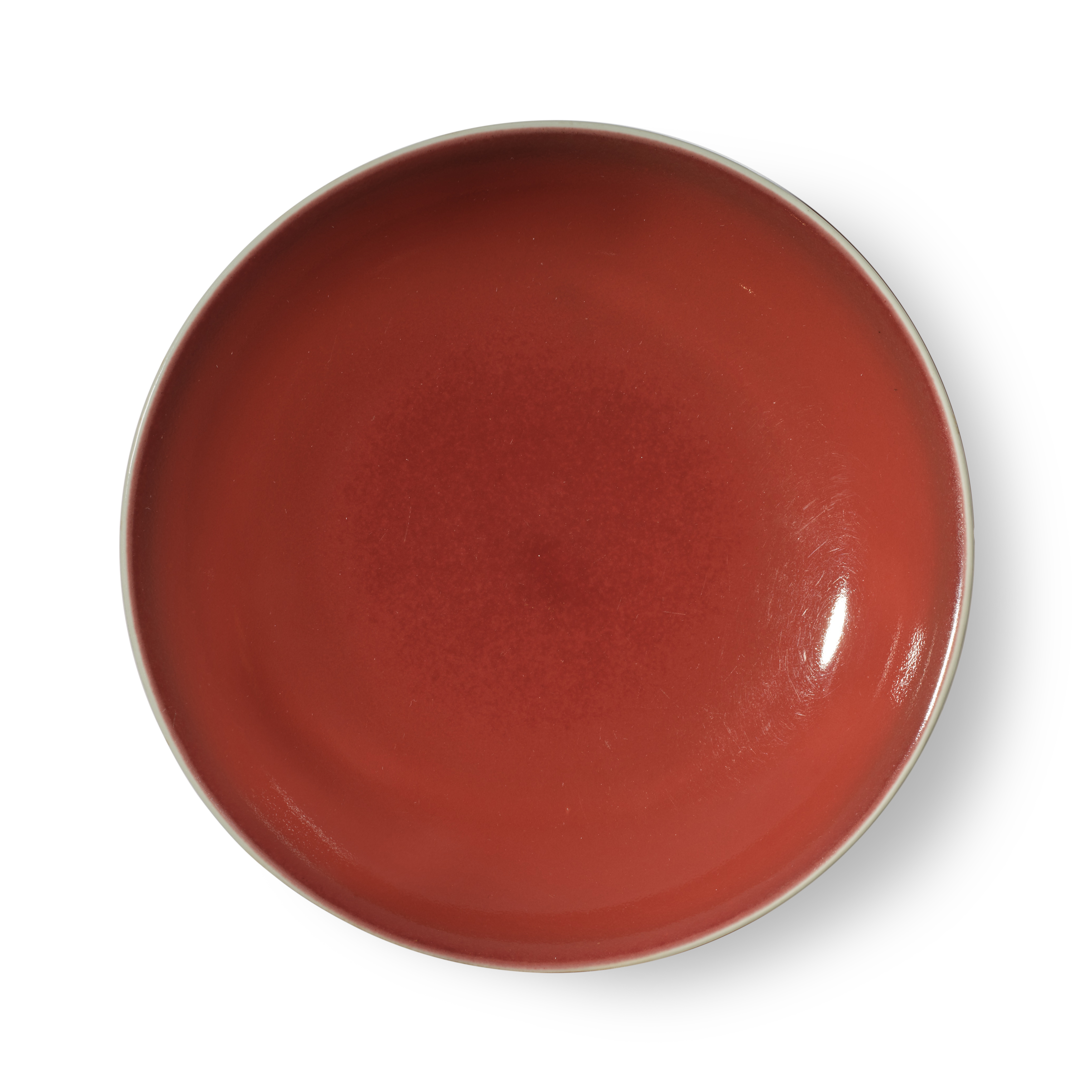 A copper-red-glazed dish — 清乾隆 紅釉盤 《大清乾隆年製》款