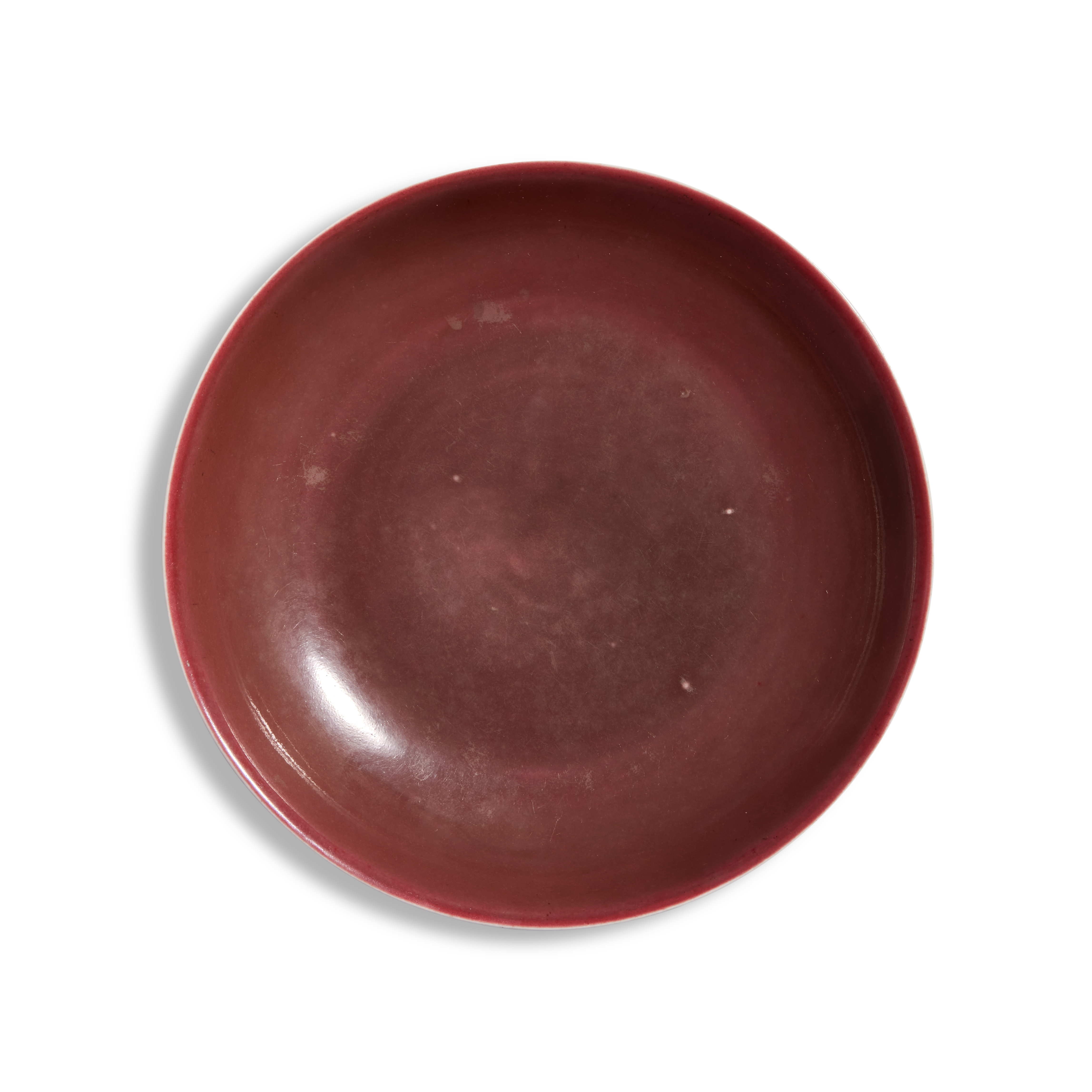 A copper-red-glazed dish — 清道光 紅釉盤《大清道光年製》款