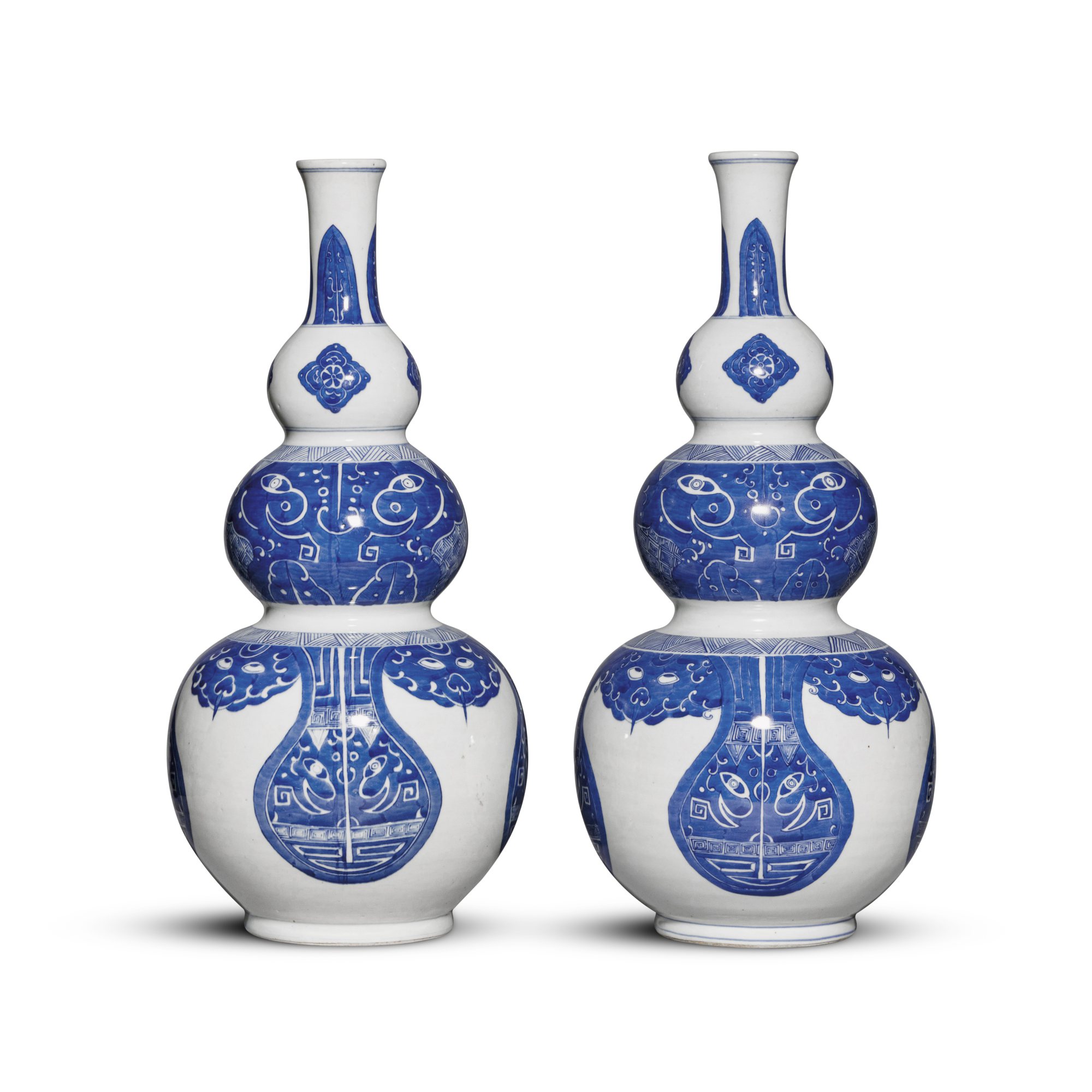 Unknown (Historical) — 清十九世紀 青花仿古饕餮紋三節葫蘆瓶一對