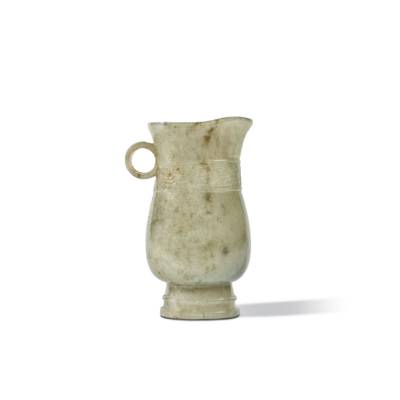 An archaistic pale celadon jade ewer