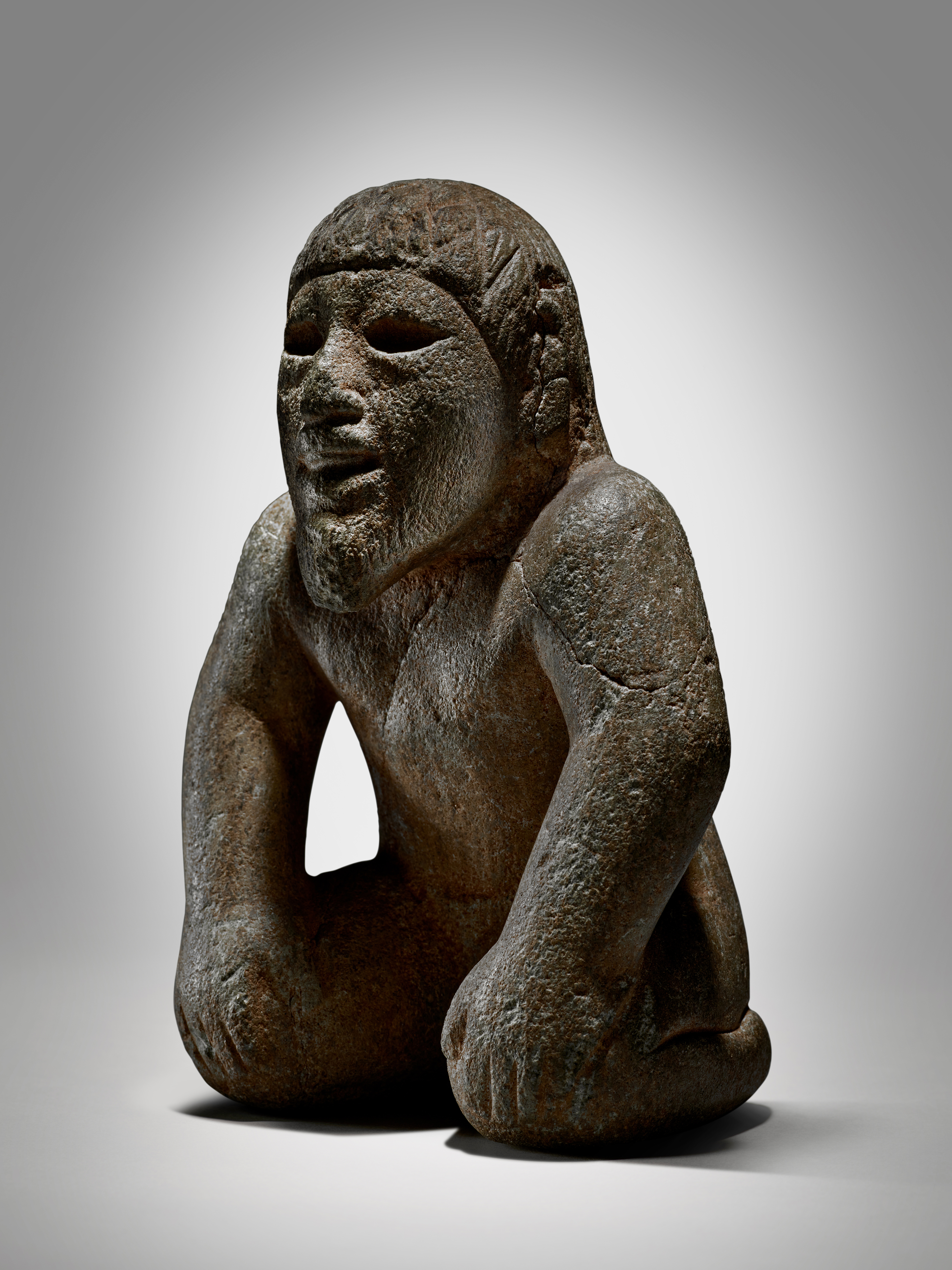 Olmec Stone Figure of a Kneeling Man — Olmec Stone Figure of a Kneeling Man, Middle Preclassic, circa 900-600 BC