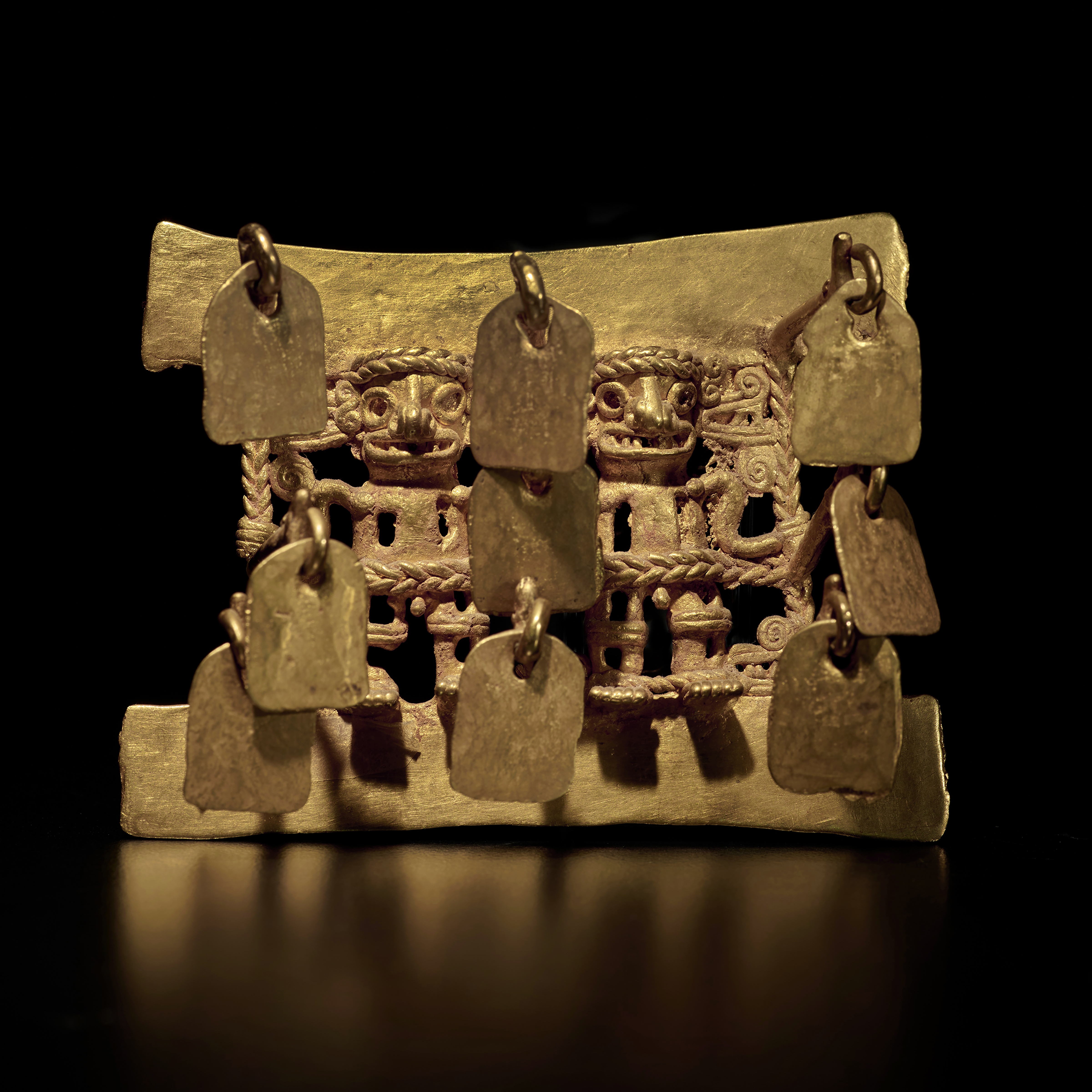 Unknown — Diquís Gold Pendant of Double Figures with Dangles, circa AD 800-1500