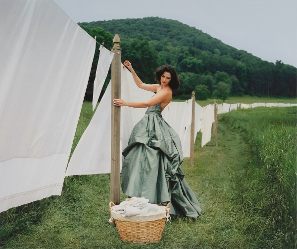 Rodney Smith — Zoe Hanging Sheets On Clothesline, Harriman, New York, 2005