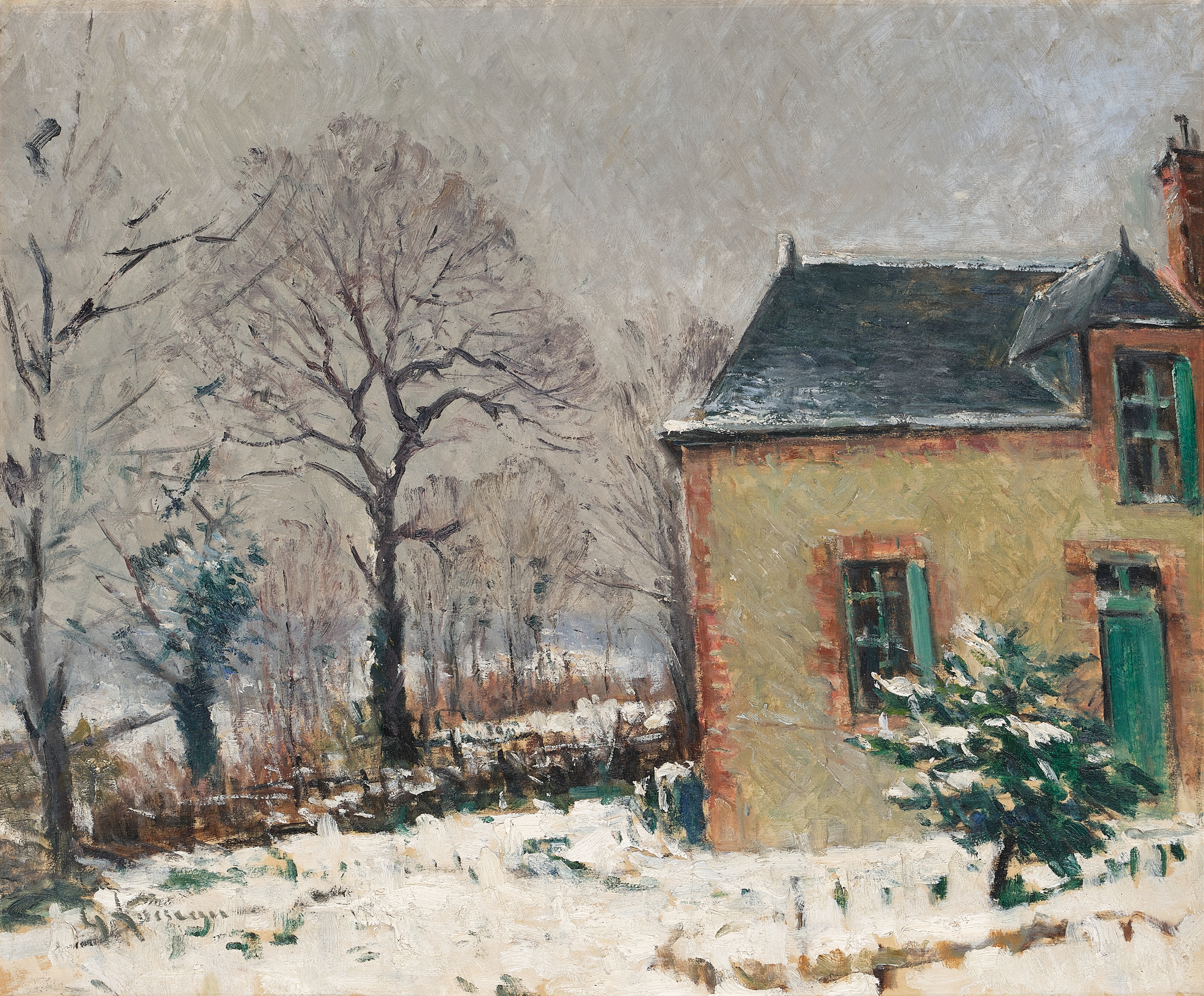 Maison campagnarde au bord d'un ruisseau sous la neige