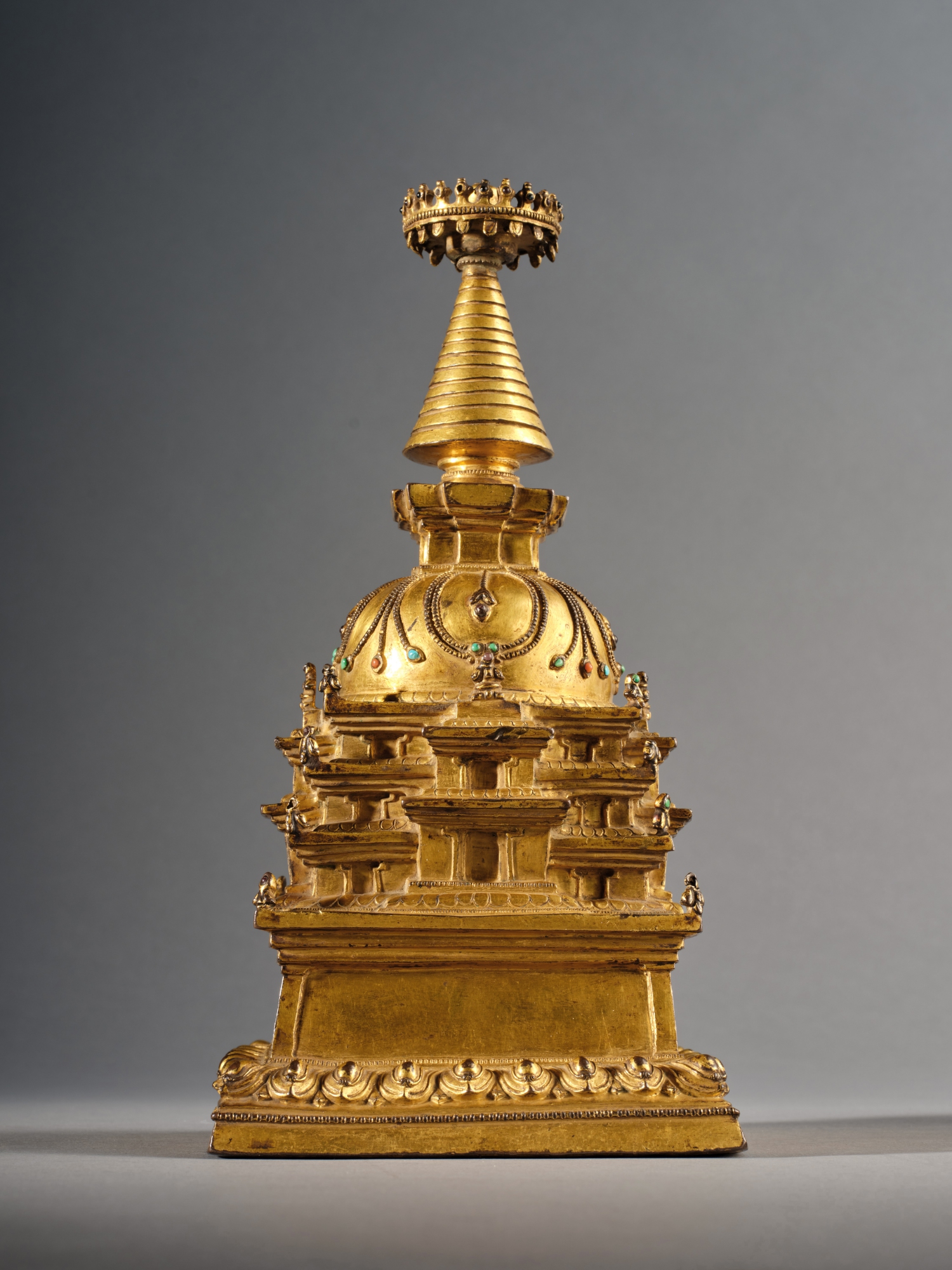 A large gilt-copper alloy stupa — A large gilt-copper alloy stupa, Tibet, 15th century