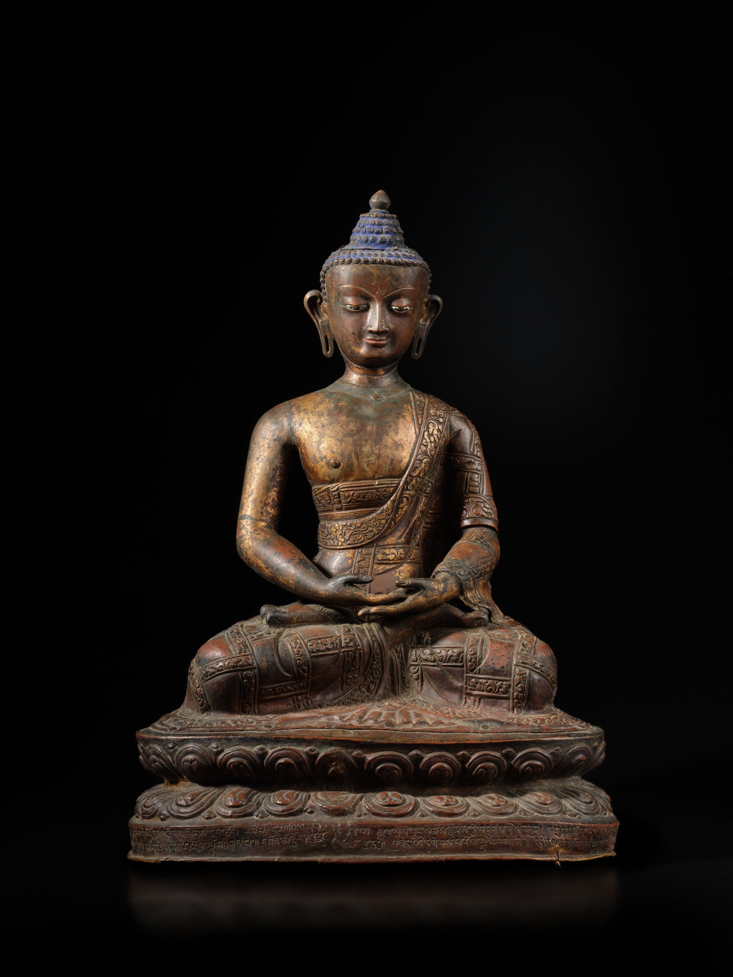 Unknown — A large inscribed copper-repoussé figure of Amitabha Buddha, Tibet or Nepal, circa 17th century