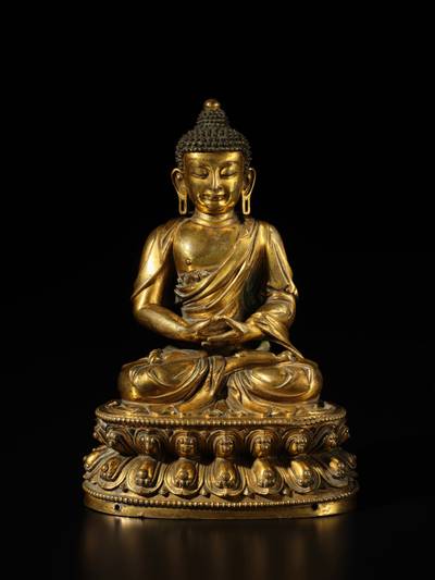 A gilt-bronze figure of Amitabha Buddha, Ming dynasty, early 15th century