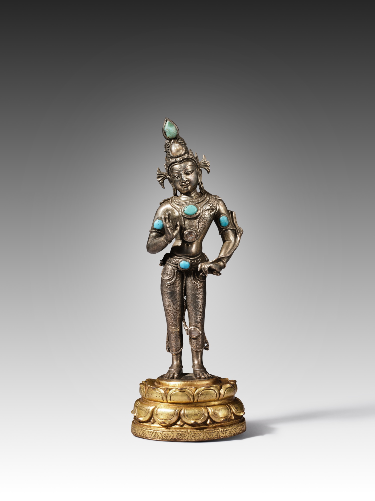The Nyingjei Lam gem-inset silver and gilt-copper figure of Avalokiteshvara Padmapani — The Nyingjei Lam gem-inset silver and gilt-copper figure of Avalokiteshvara Padmapani, Tibet, 12th / 13th century
