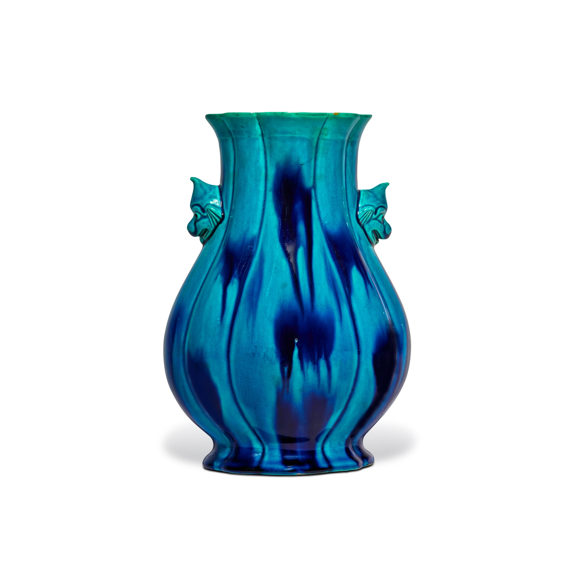 An archaistic turquoise-glazed hu-form vase — 清十八 / 十九世紀 孔雀藍釉仿古獸首耳壺