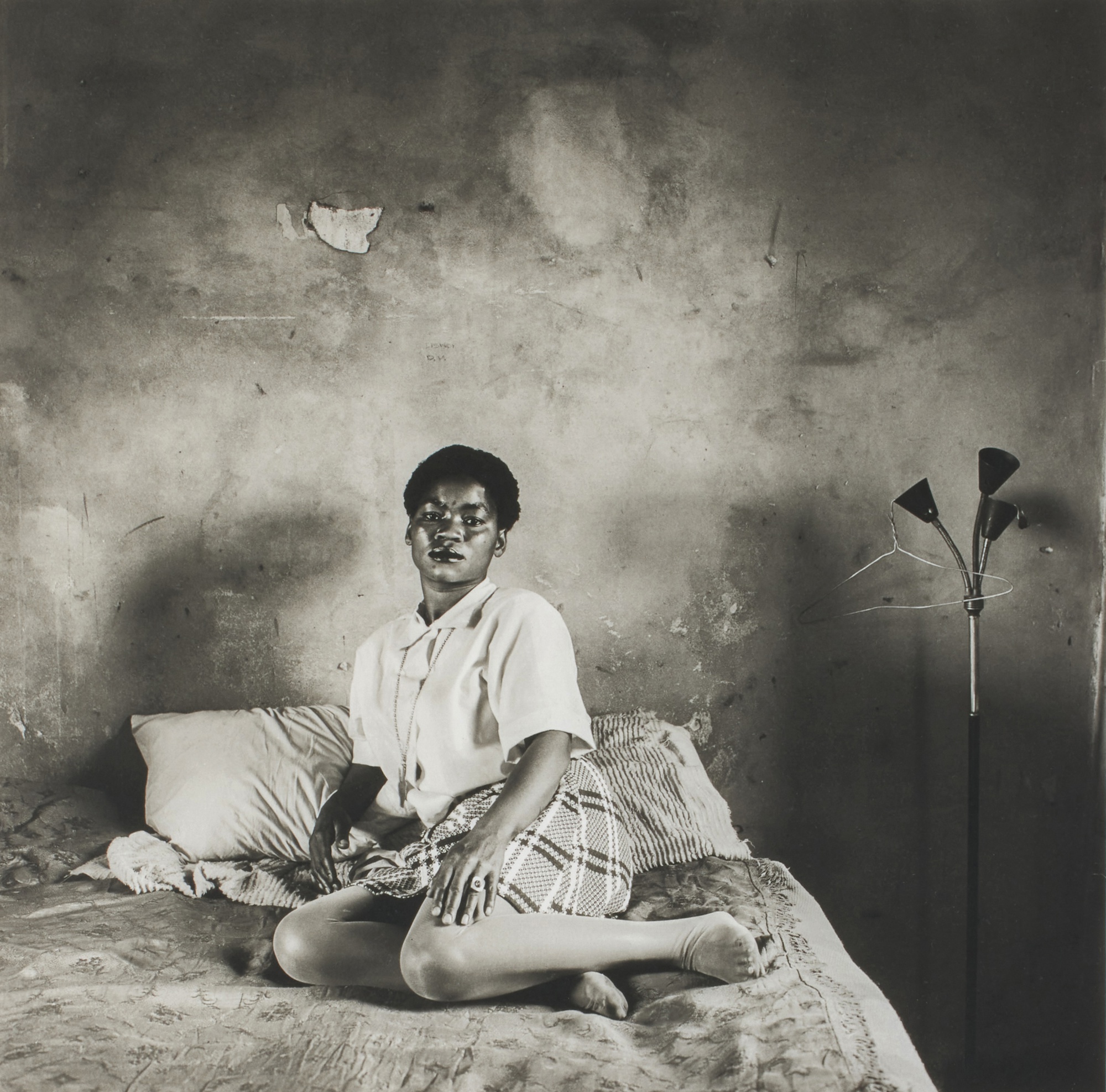 David Goldblatt — Mrs. Miriam Diale in her Bedroom, 5357 Orlando East, Soweto, Johannesburg, 18 October 1972