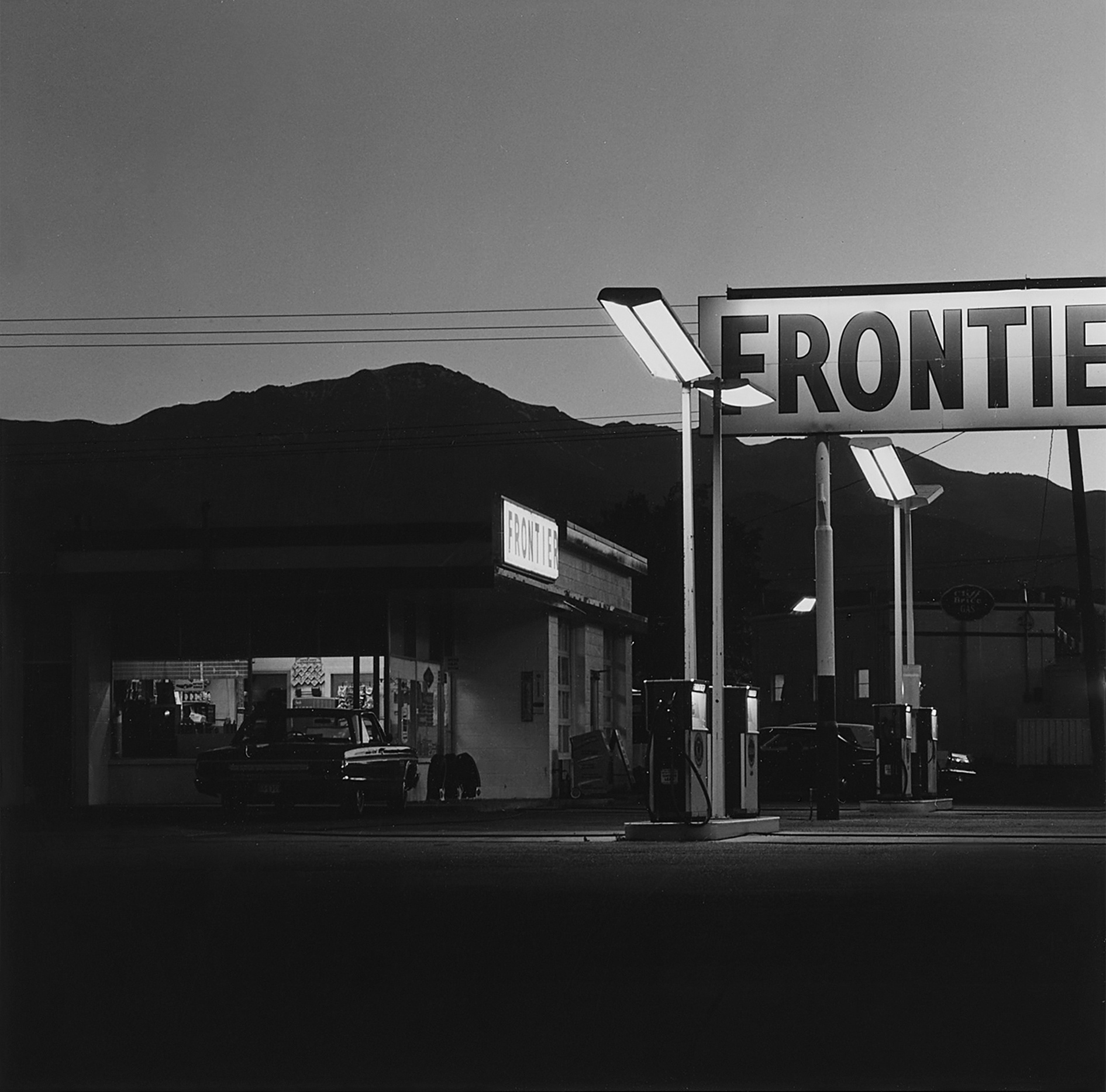 Robert Adams — '"Frontier" Gas Station and Pike's Peak, Colorado Springs, Colorado'