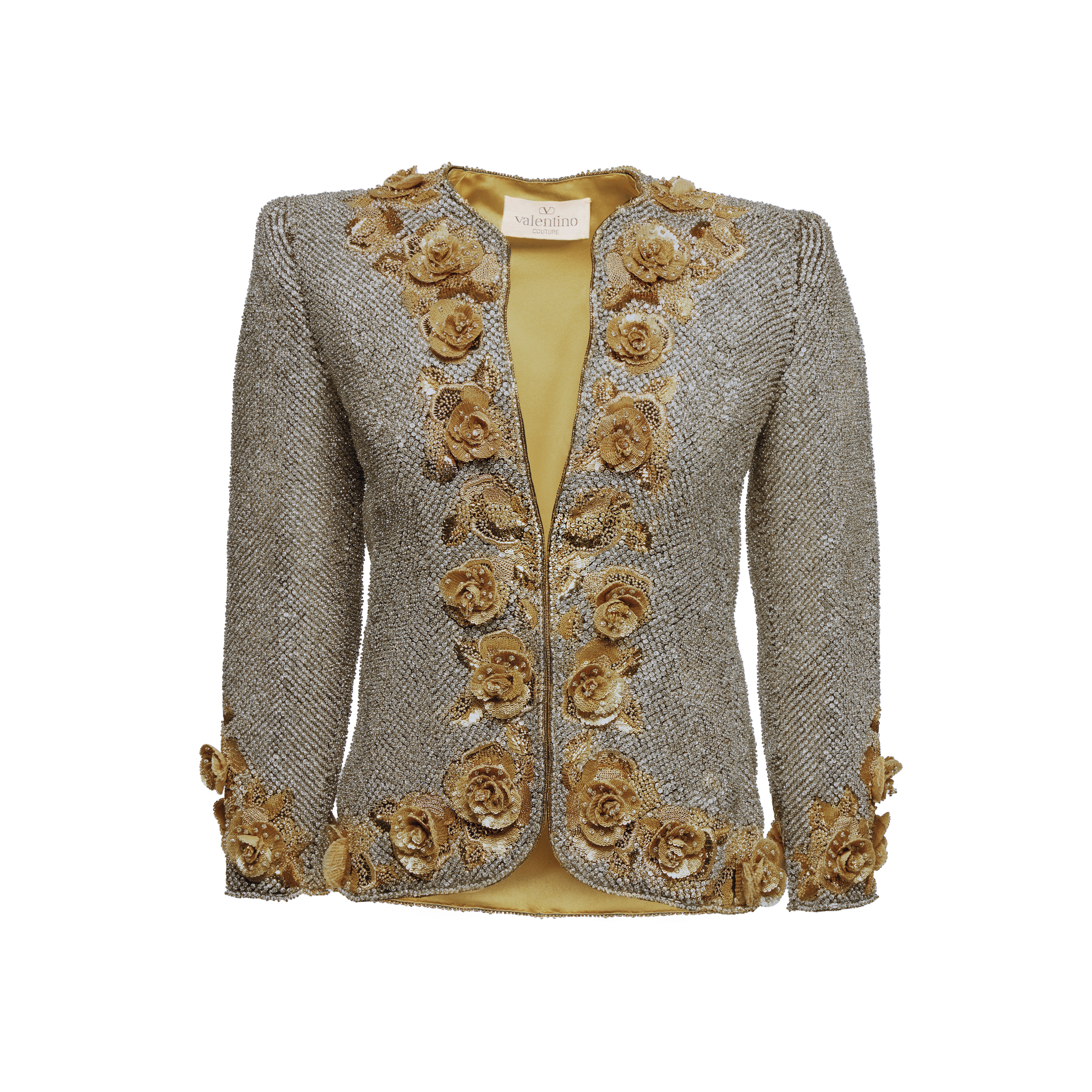 Valentino Garavani Haute Couture Lavishly Embellished Evening Jacket, Autumn-Winter 1989-90, entirely covered in Swarovski crystals, with three-dimensional gold beaded flowerhead accents and a gold silk lining, labeled, bust 32-34in max, 81-86cm, shoulders: 15in, 38cm, sleeve length: 21in, 53cm —  Haute Couture Lavishly Embellished Evening Jacket, Autumn-Winter 1989-90