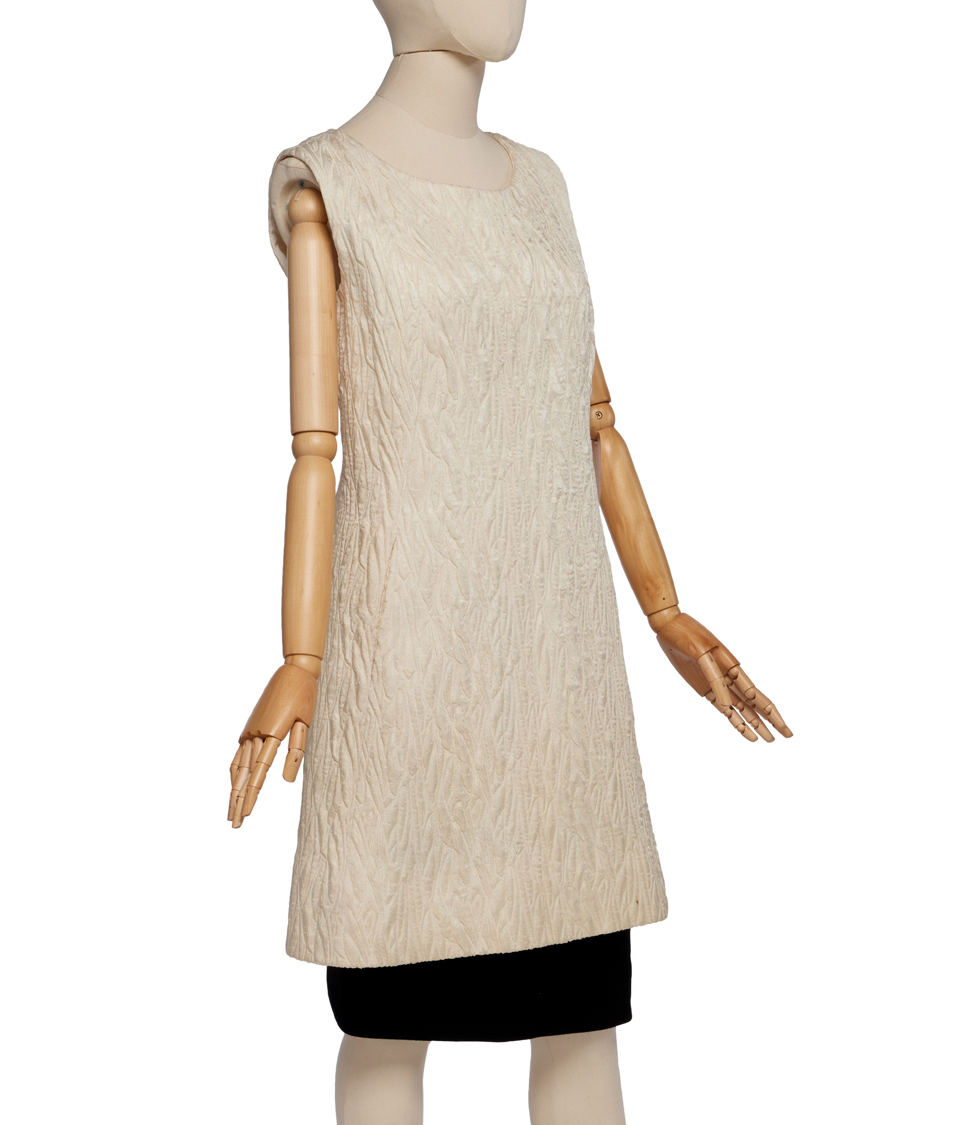 Cristóbal Balenciaga Haute Couture Ivory Matelassé Mini Dress, circa 1967, with black moss crêpe zoccolo underskirt and concealed slit pockets to front, labeled and numbered 100068, dress, bust: 36 inches, 92 cm, skirt, waist: 30 inches, 76 cm — Haute Couture Ivory Matelassé Mini Dress, circa 1967