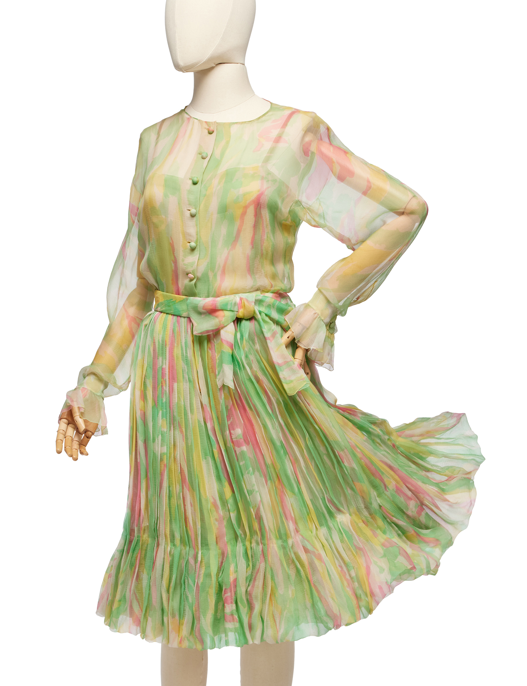Christian Dior by Marc Bohan Haute Couture, Pastel Chiffon Dess, Spring-Summer 1965, with self-covered buttons, bow belt and stiffened pleated hem, labelled and numbered 1306, bust: 36in, 92cm, waist: 24in, 61cm — Haute Couture Pastel Chiffon Dress, Spring-Summer 1965