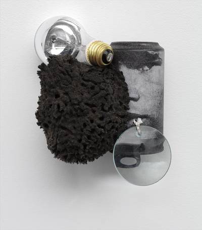 soda cans, magnifying glass, string, paint, xerox, socks, coal, and light bulb