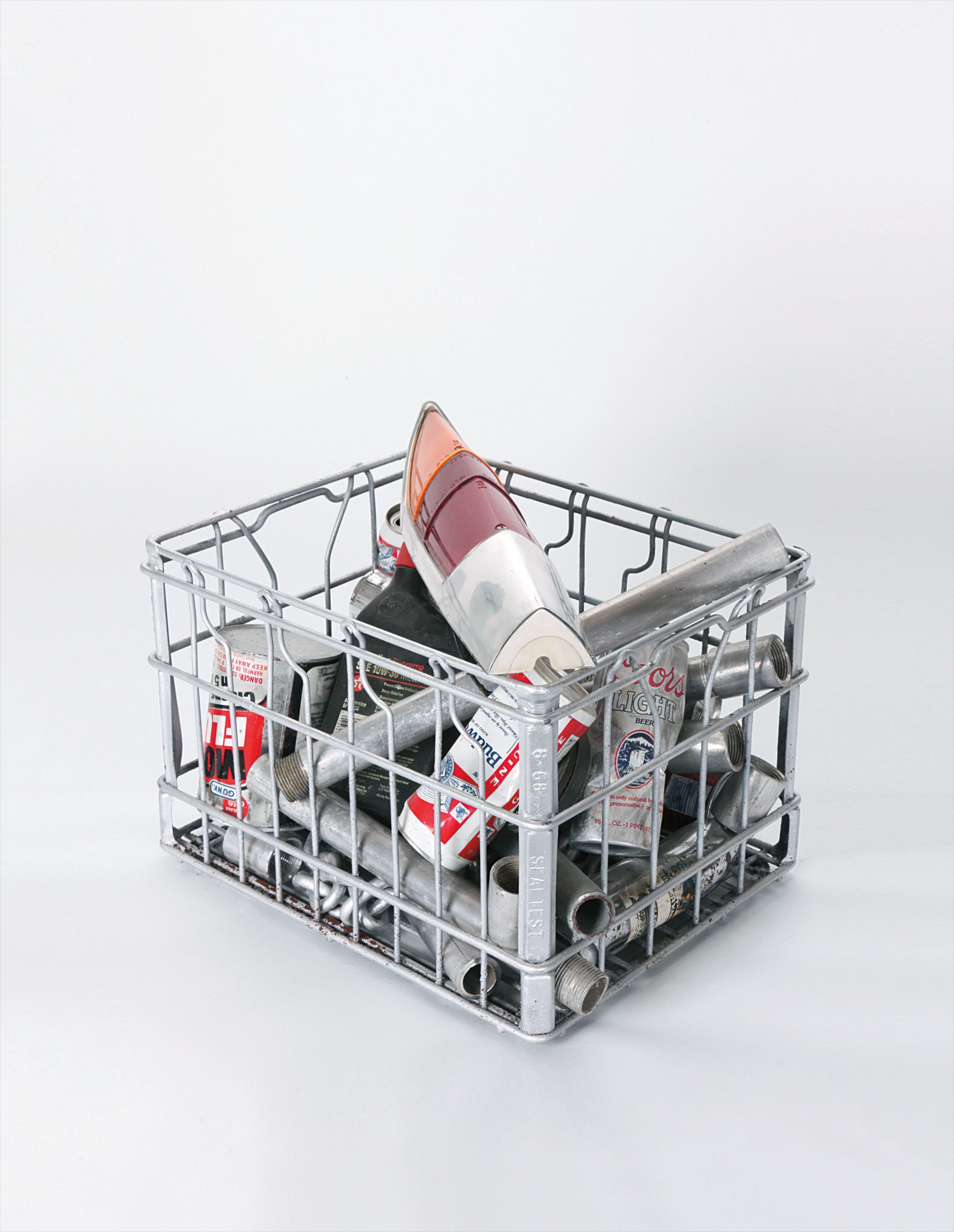 metal basket, car parts, beer cans