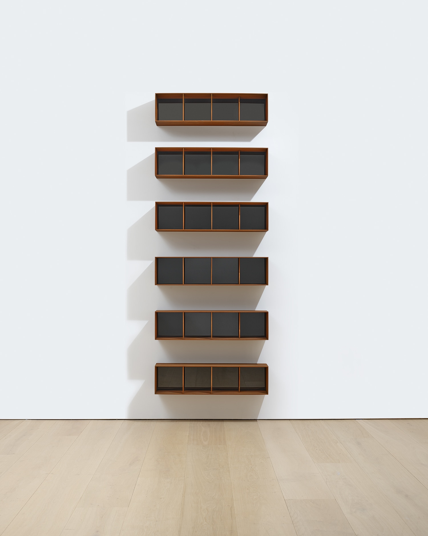 Donald Judd — Cor-ten steel and black Plexiglas, in 6 parts