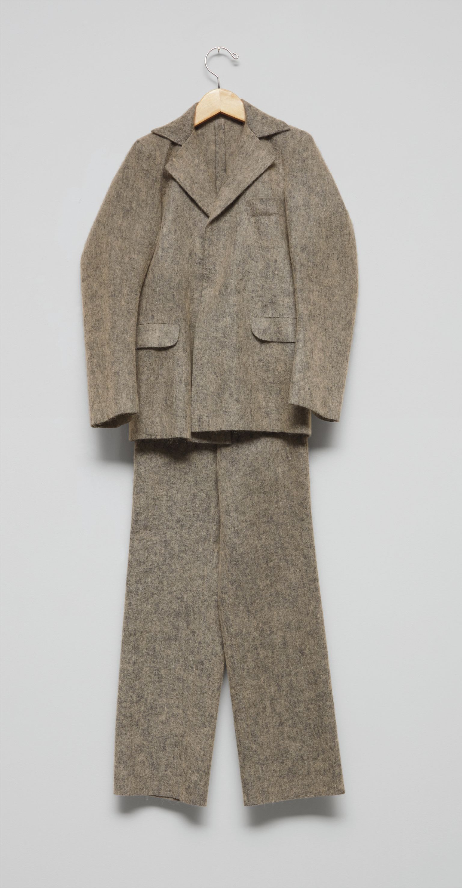 Maurizio Cattelan — felt suit, wood and metal hanger
