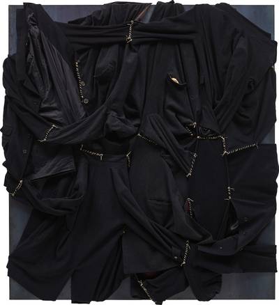 fabric, buttons and string on steel panel