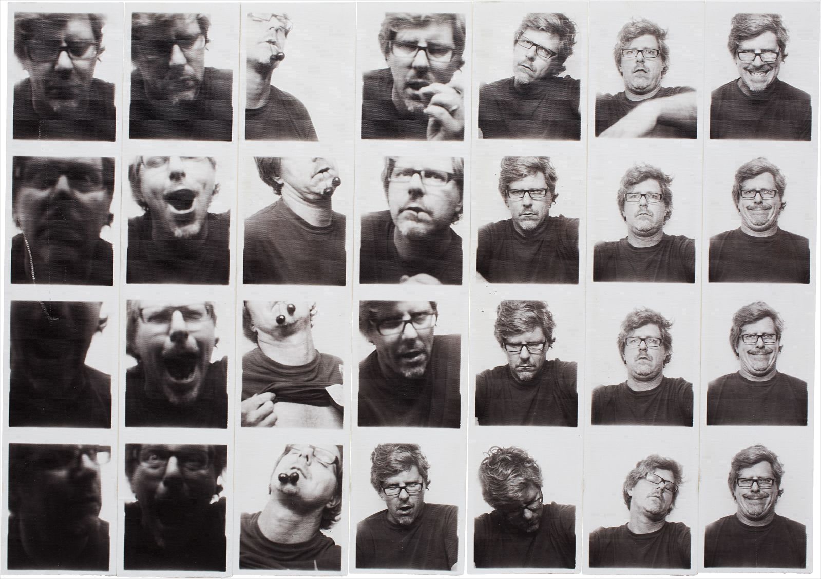 28 photographs in 7 strips mounted on board