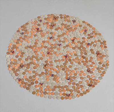 pennies, nickels, dimes and iridescent ruby red marbles