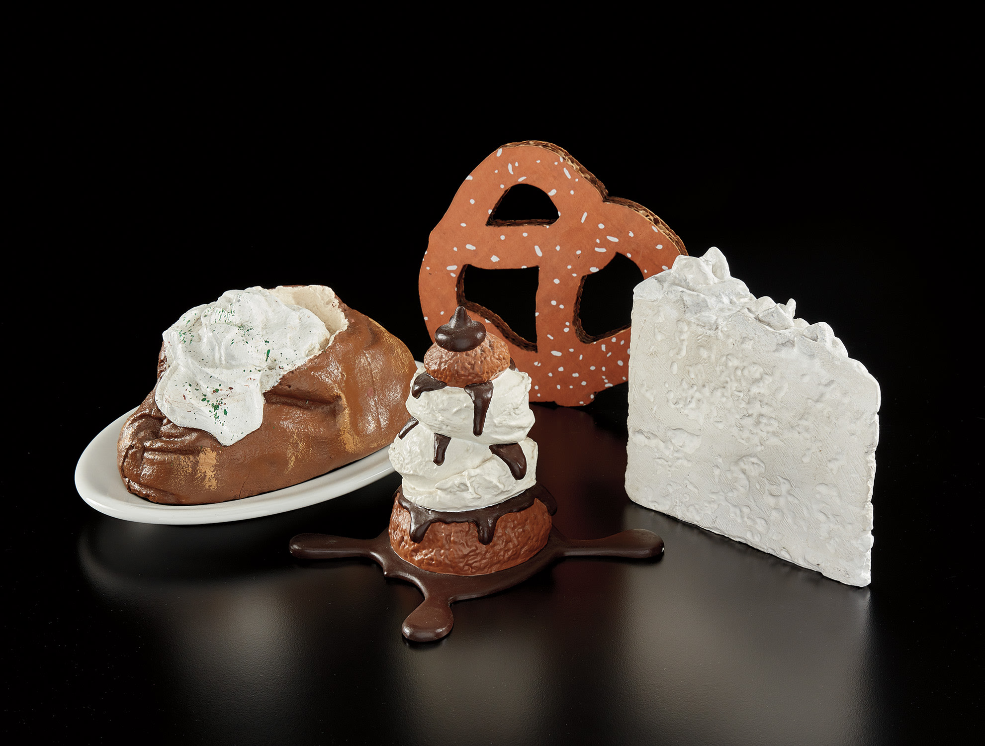 Claes Oldenburg — Wedding Souvenir; Baked Potato; Profiterole; and N.Y.C. Pretzel (P. 5; P. 3; G. 1457, P. 22; A. & P. 250.1)