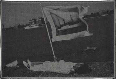 Holding flag laying at the edge of Pier 54 and the Hudson River