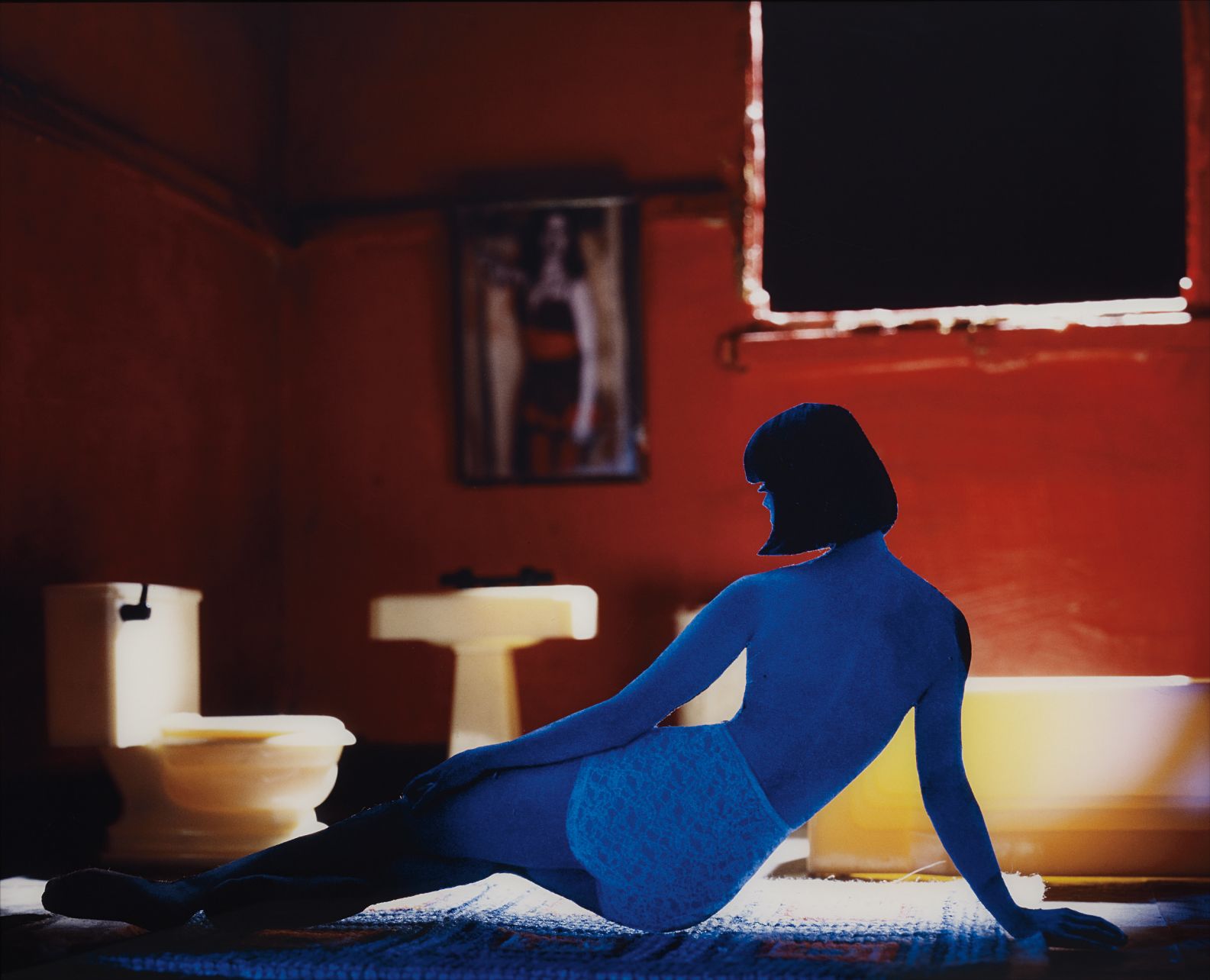 Laurie Simmons — The Long House (Red Bathroom/ Blue Figure)