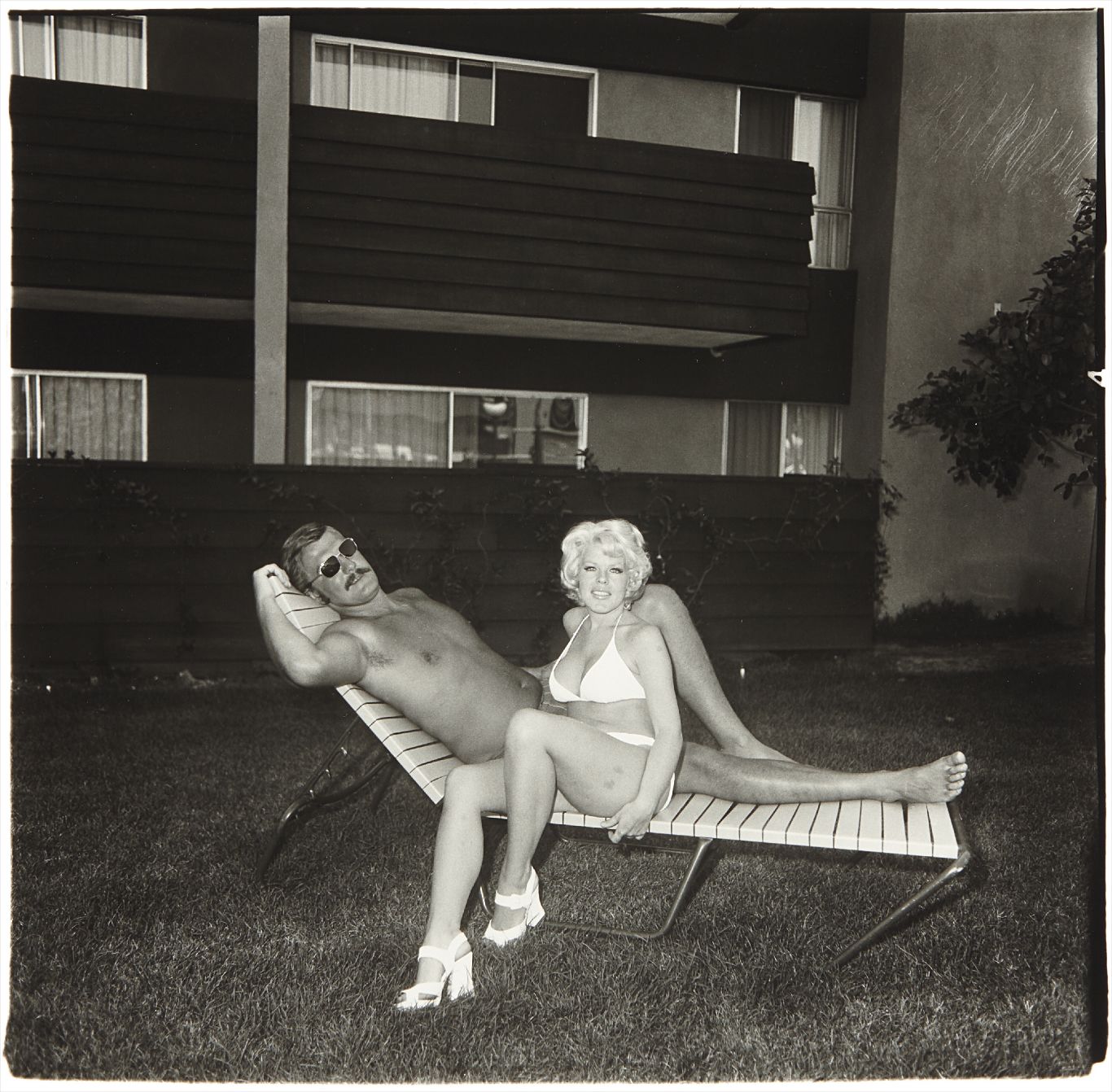 Diane Arbus — South Bay Singles: Couple on a Chaise Lounge