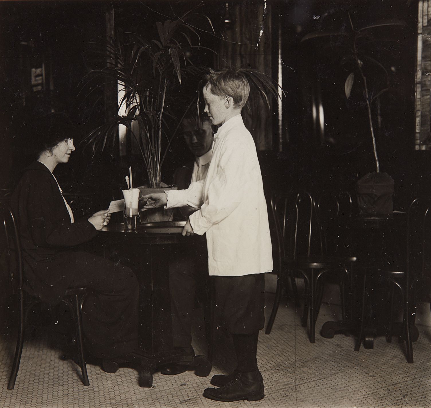 Lewis Hine — A young table boy in Newsome's ice cream parlor, Birmingham, Alabama, October