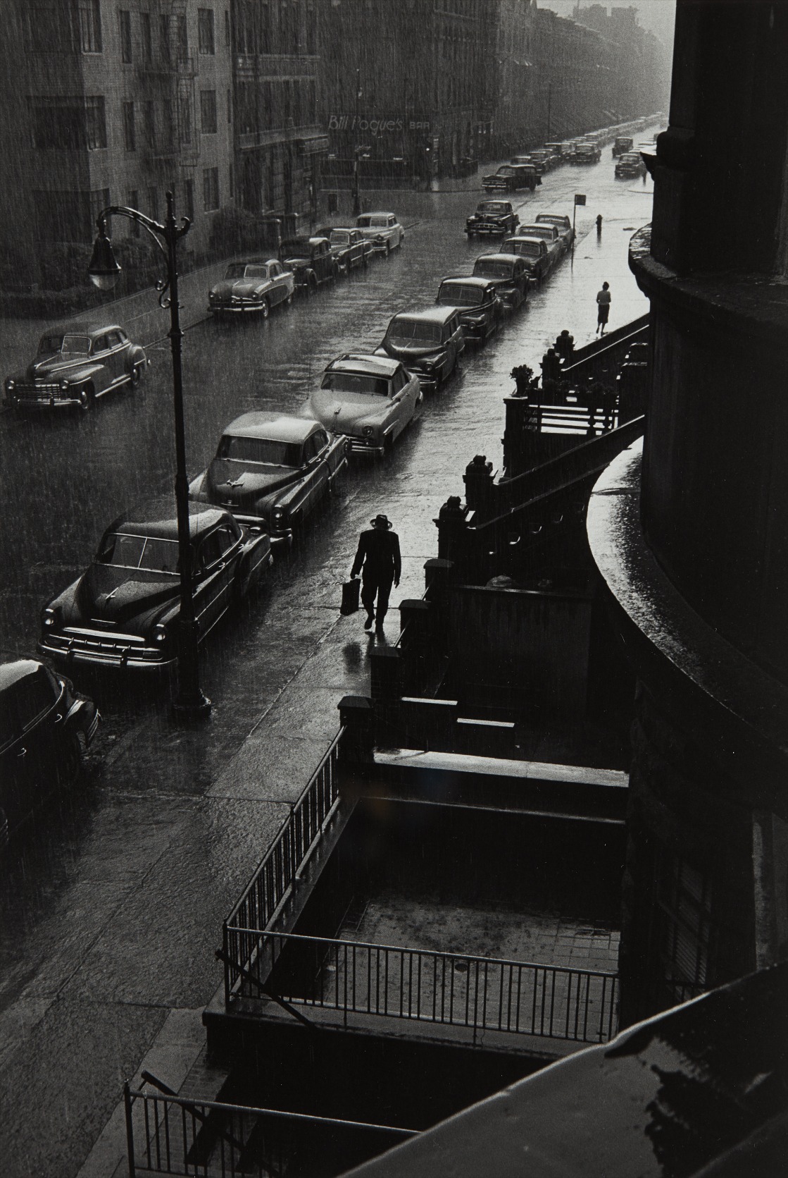 Ruth Orkin — Man in Rain, W. 88th St., N.Y.C.