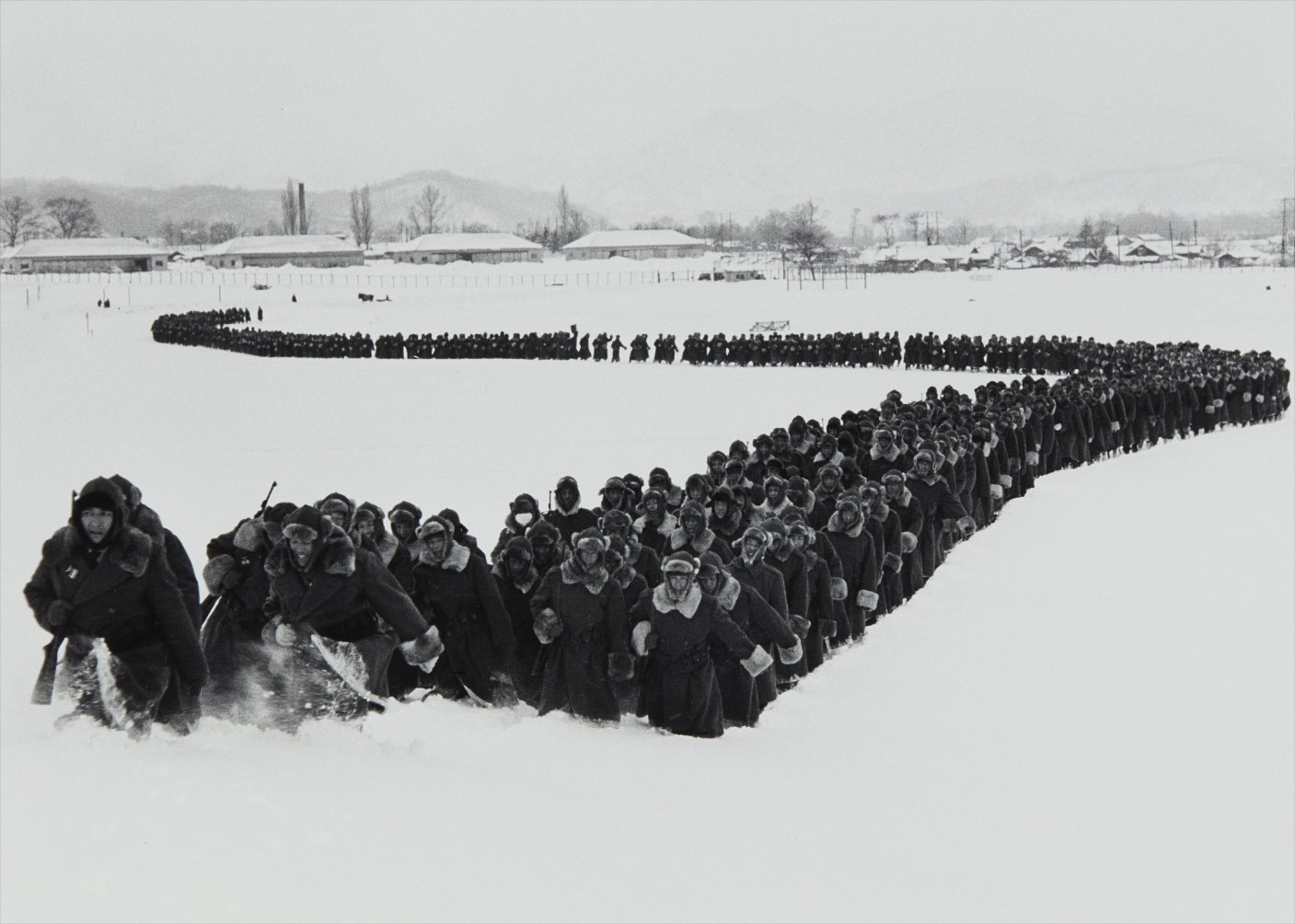 Carl Mydans — The newly created 'Japanese Police Force' moves out of camp for winter training, Hokkaido, Japan