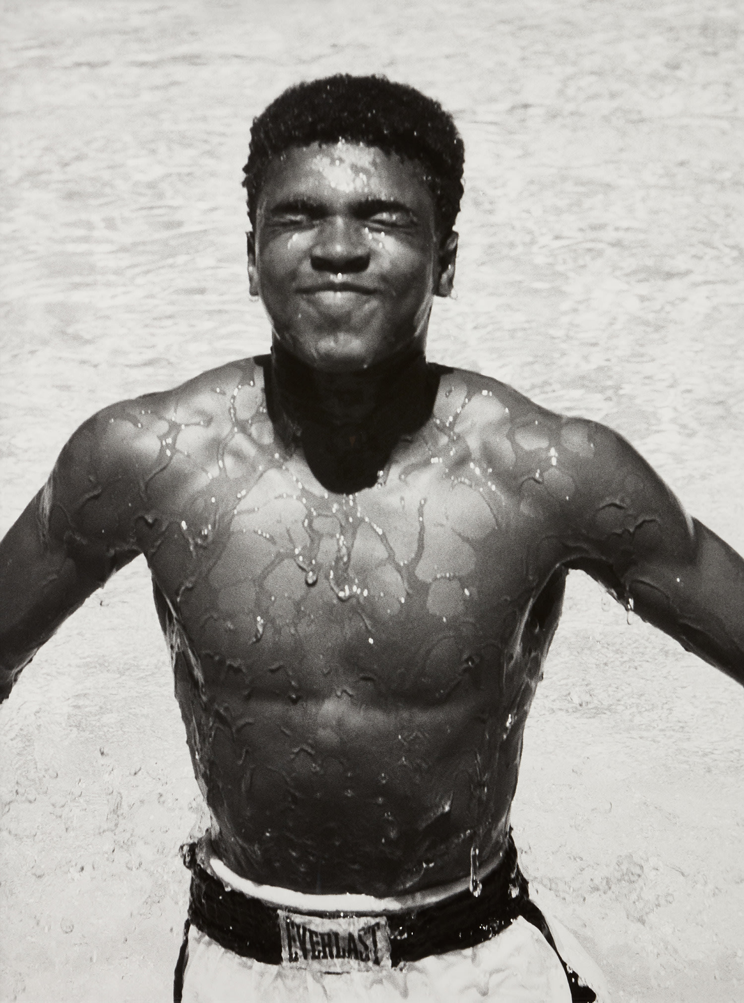 Flip Schulke — Ali Swimming Pool Jump (eyes closed)