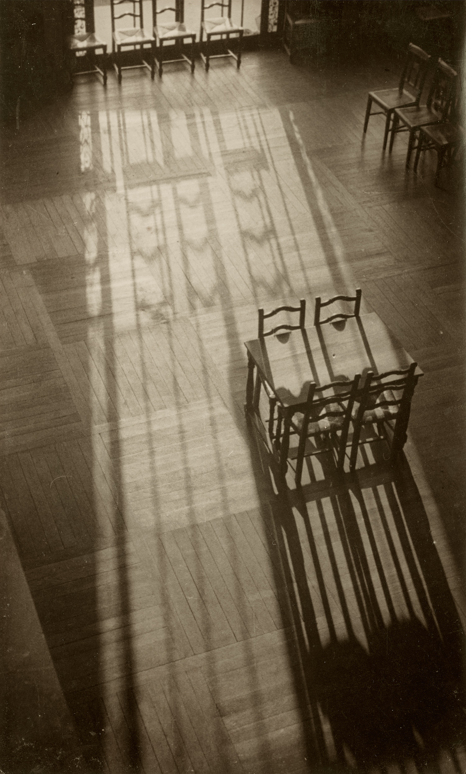 André Kertész — Chairs in the American Library, Paris
