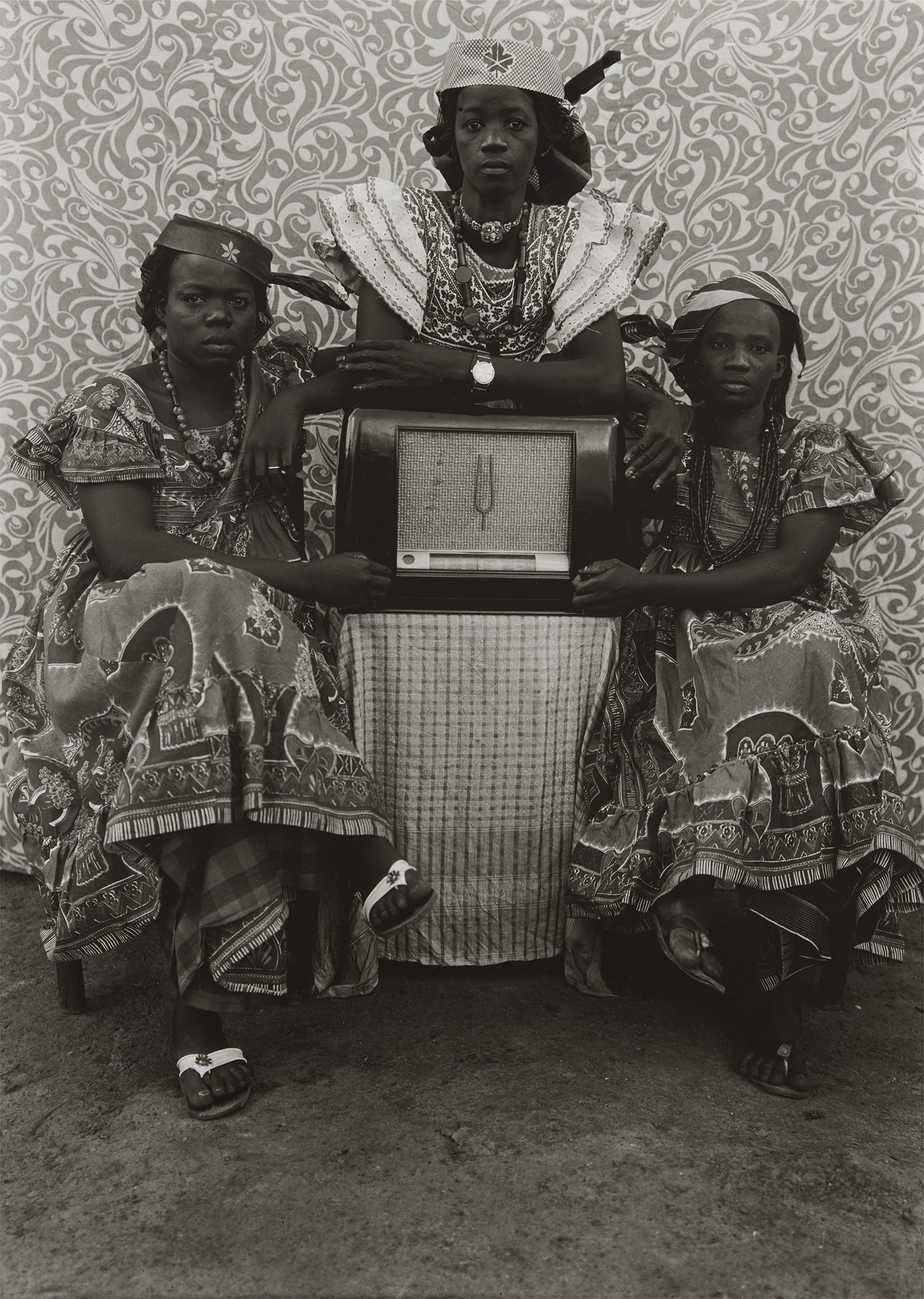 Seydou Keïta — Three women wearing 'Grand dakar' dresses and 'a la de gaulle' headscarves