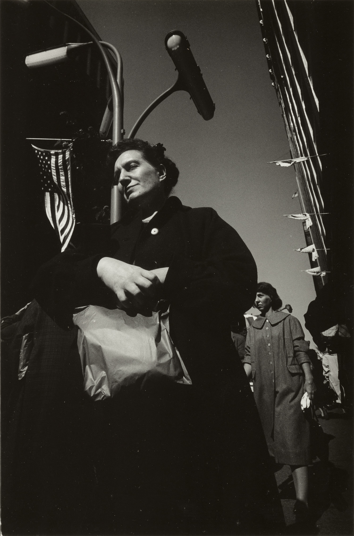 Harry Callahan — Chicago (woman carrying paper bag)