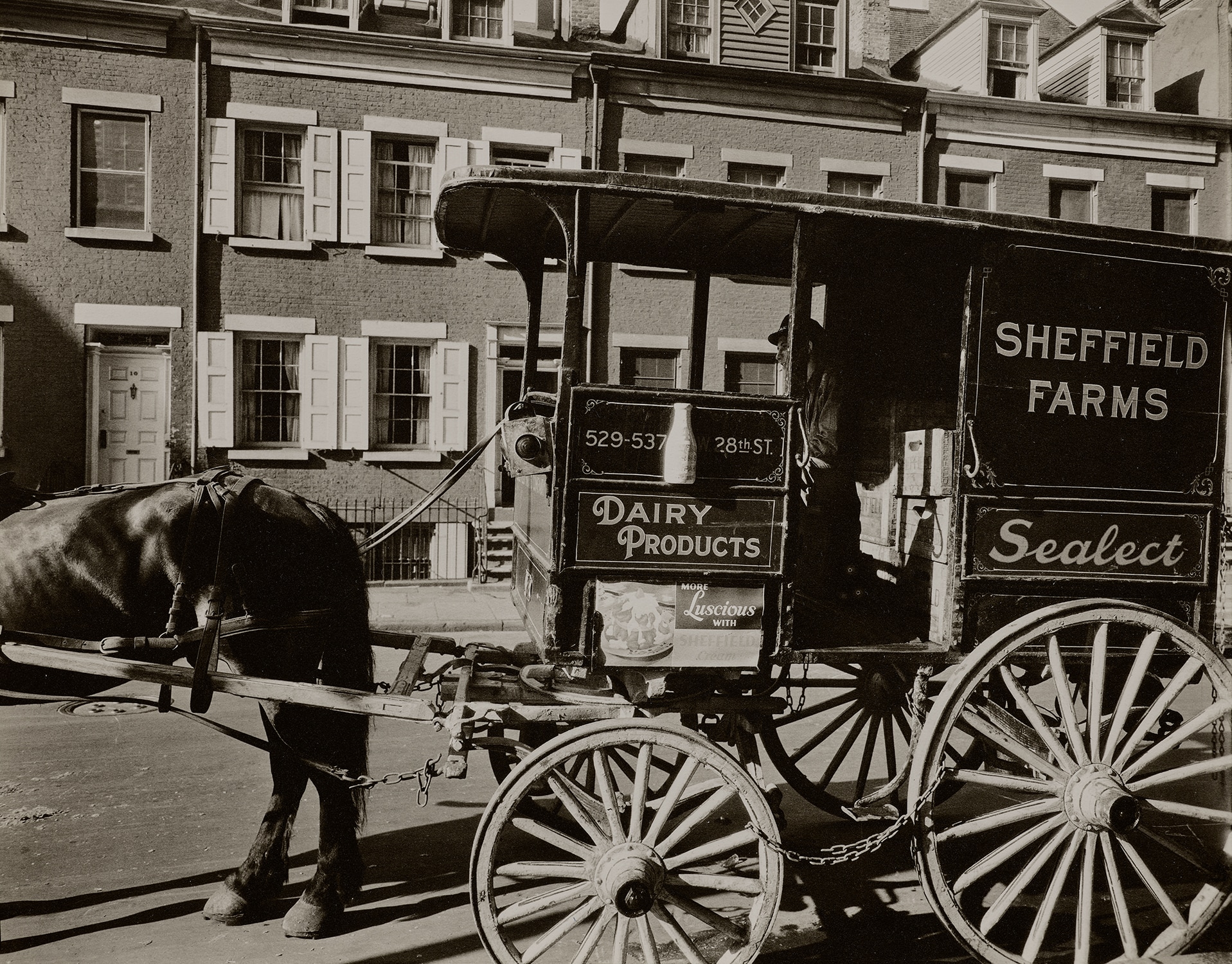 Berenice Abbott — Milk Wagon and Old Houses, 8-10 Grove Street, Manhattan