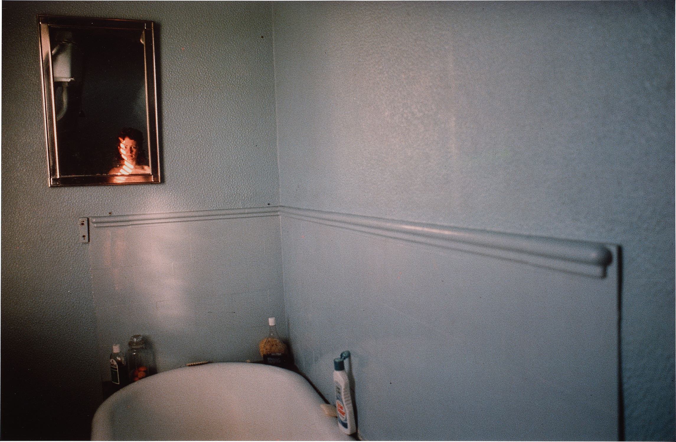 Nan Goldin — Self-portrait in the mirror, London