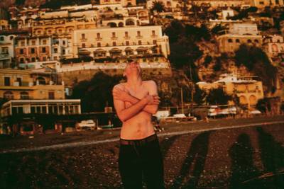 Pawel laughing on the beach, Positano, Italy