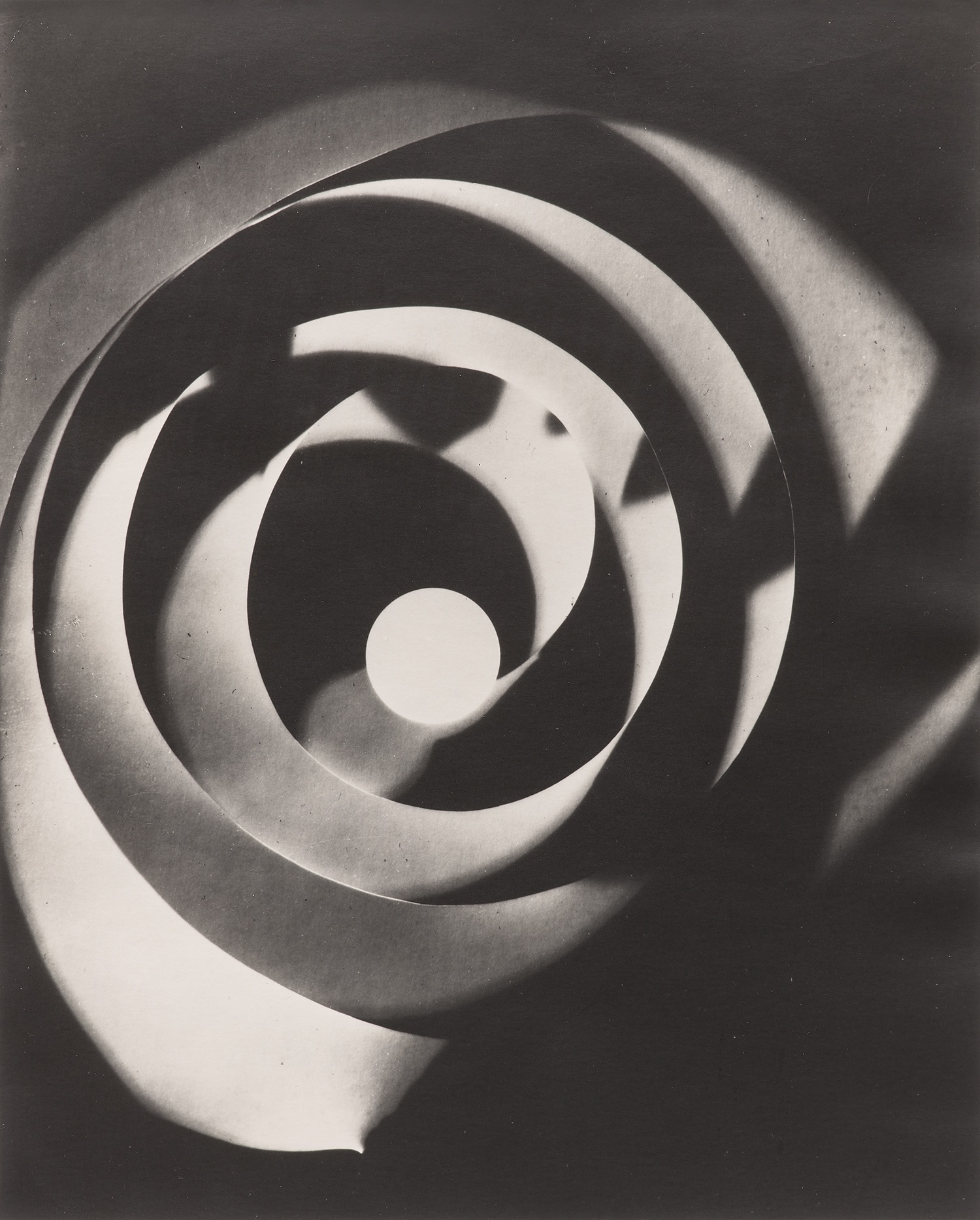 Man Ray — Rayograph (spiral)