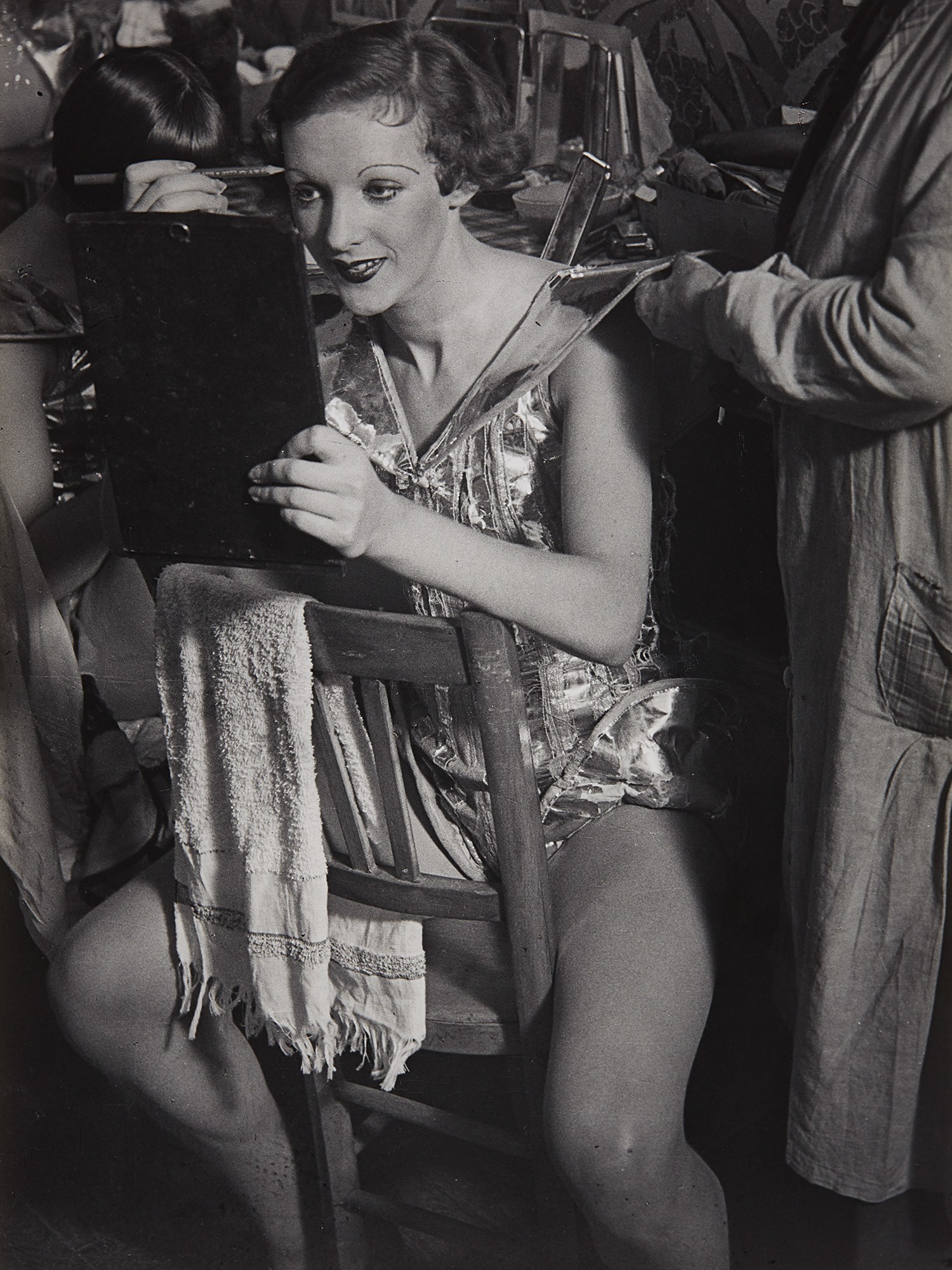 Brassaï (Gyula Halász) — An English girl in her dressing room at the Folies-Bergère