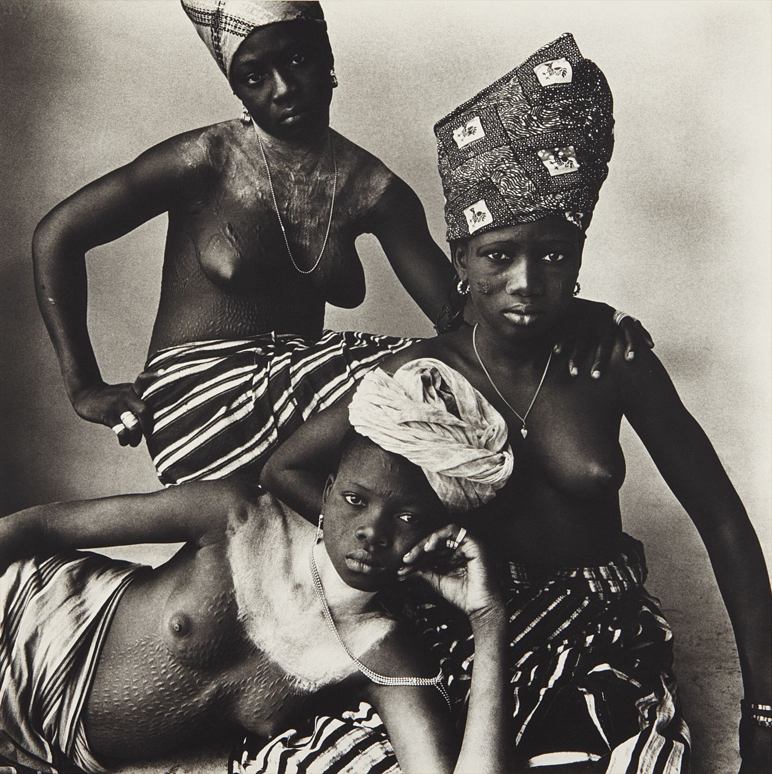 Irving Penn — Three Dahomey Girls, One Reclining